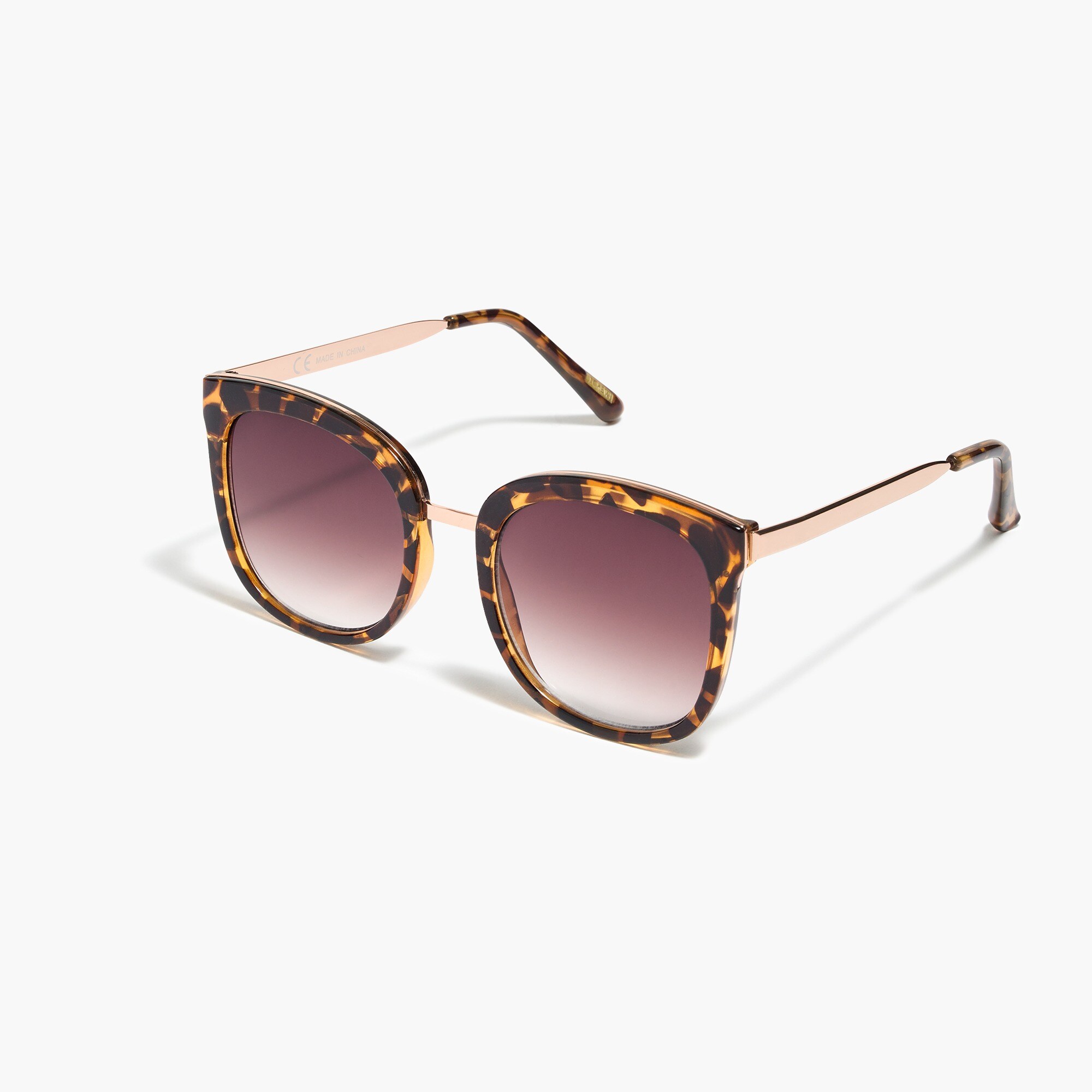 Oversized gold-frame sunglasses