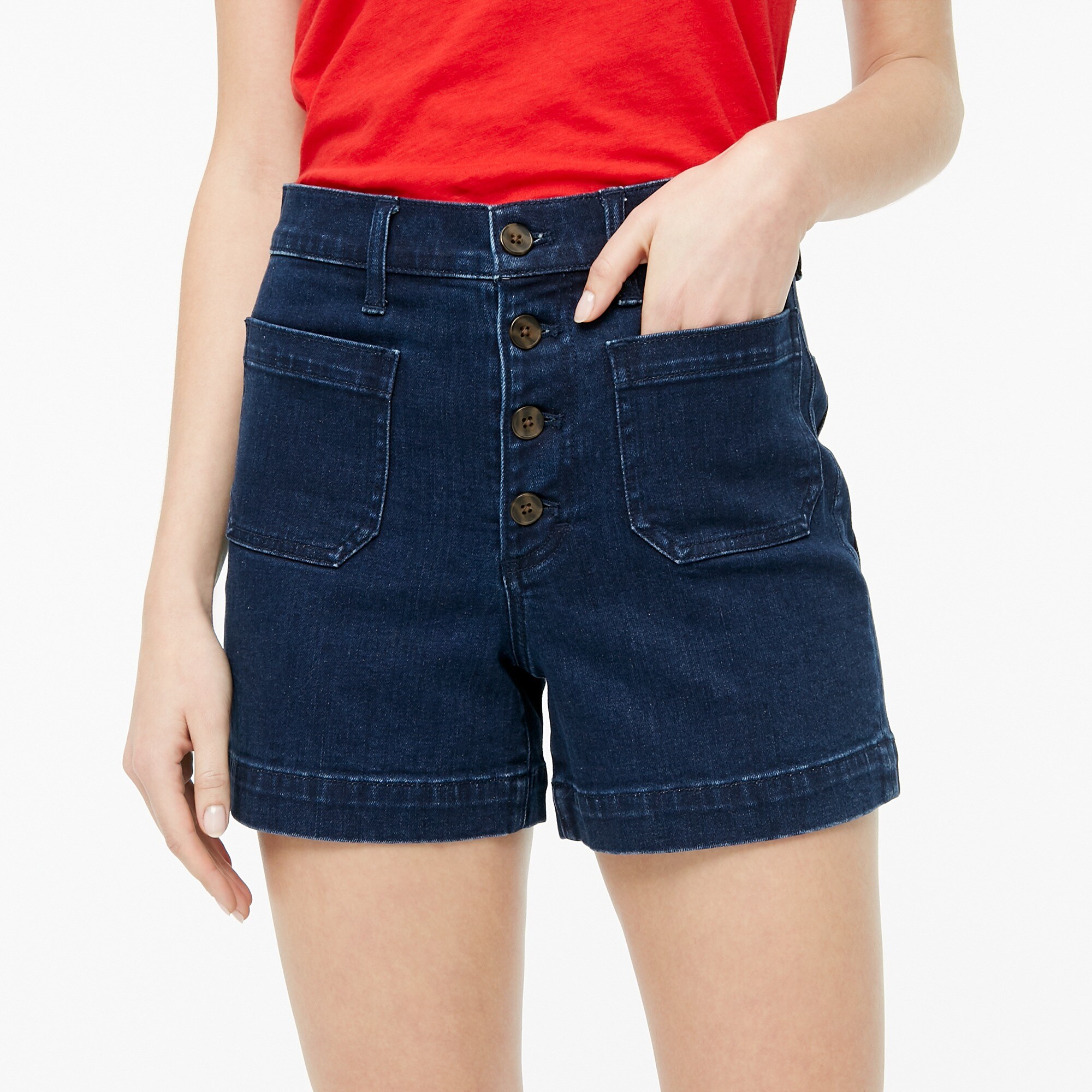 jean shorts with pockets showing