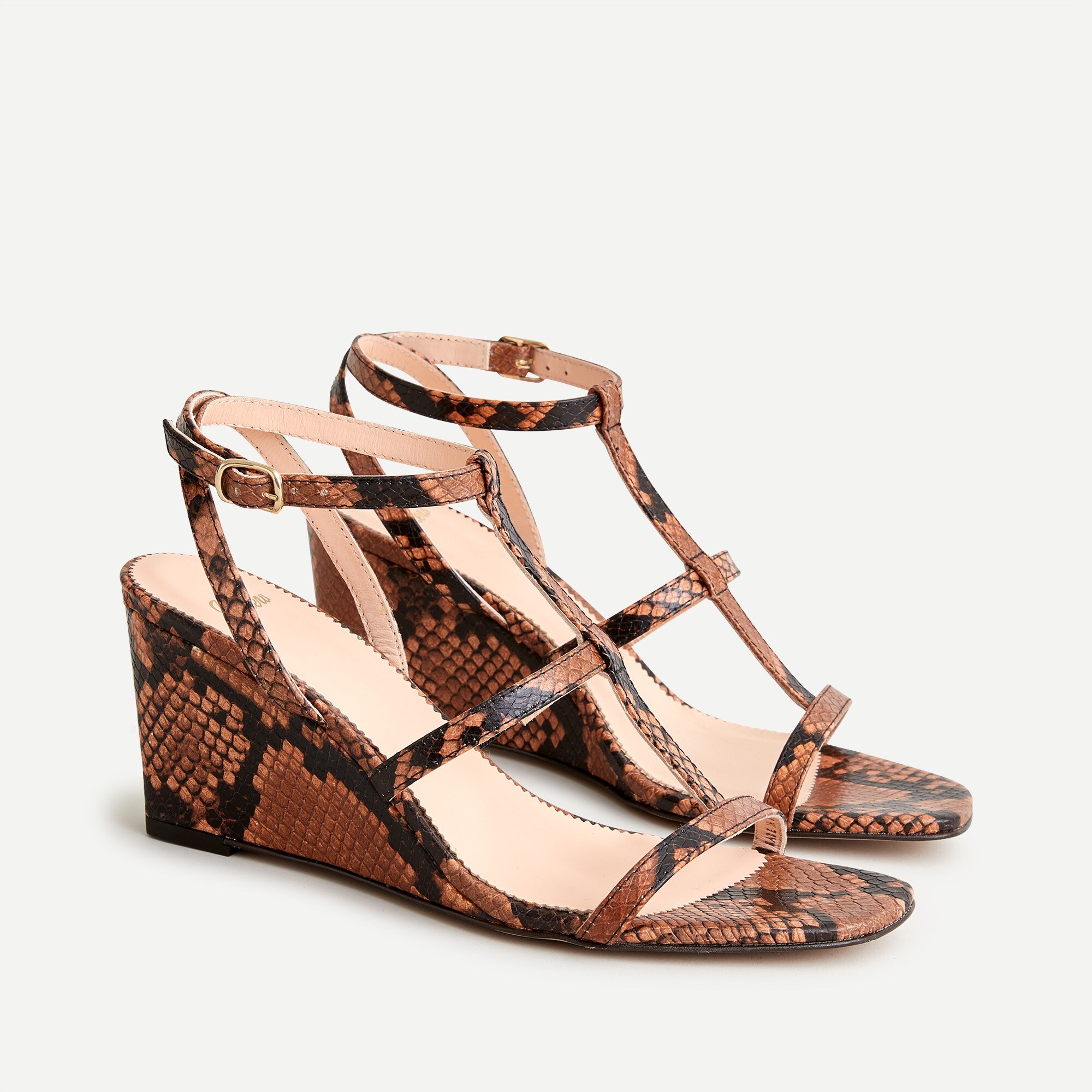 T-strap wedges in snake-embossed leather