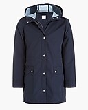 Midi-length raincoat with snaps