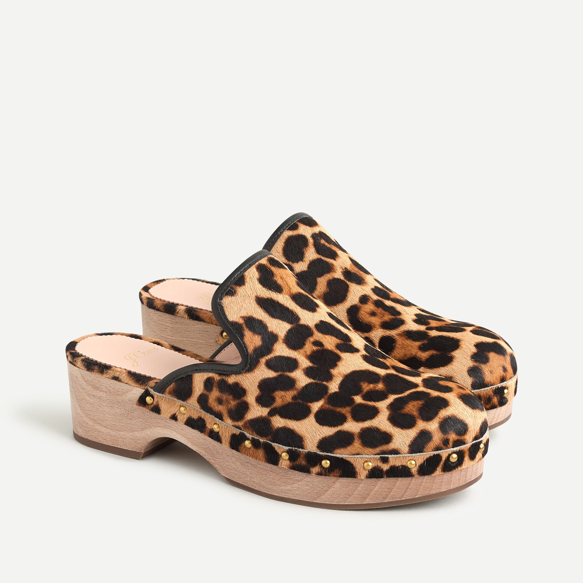 Clogs in leopard calf hair