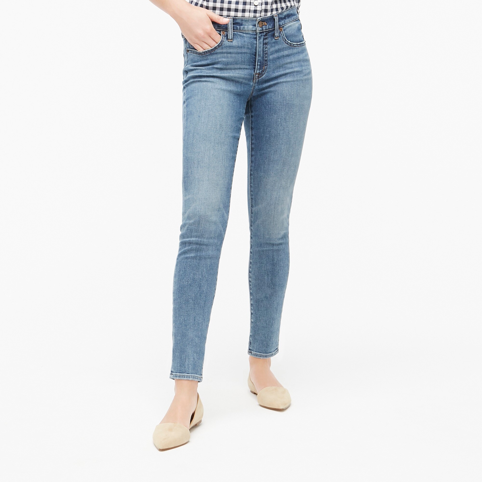 wonderfit mid wash denim skinny jeans