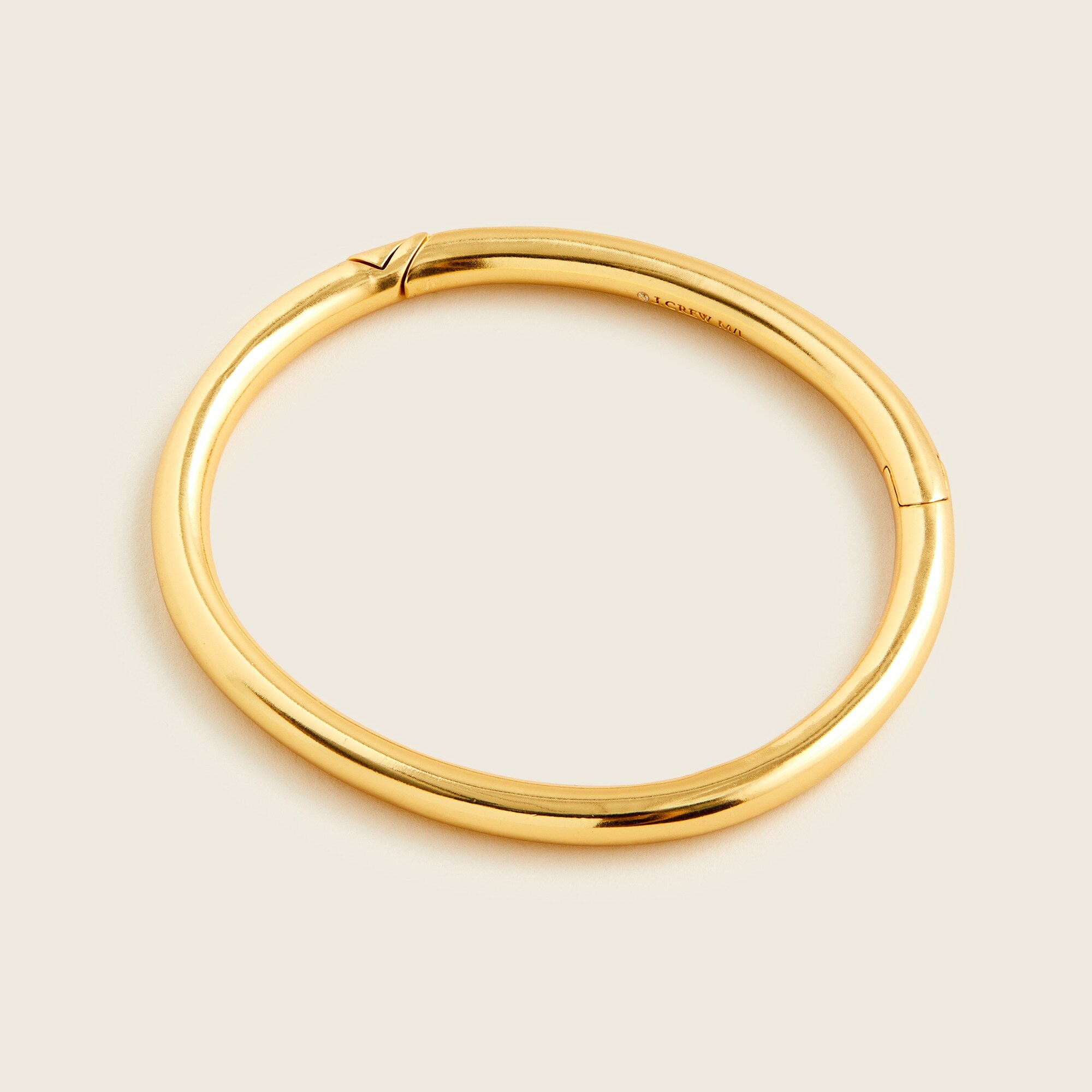 Hinge-closure gold bangle