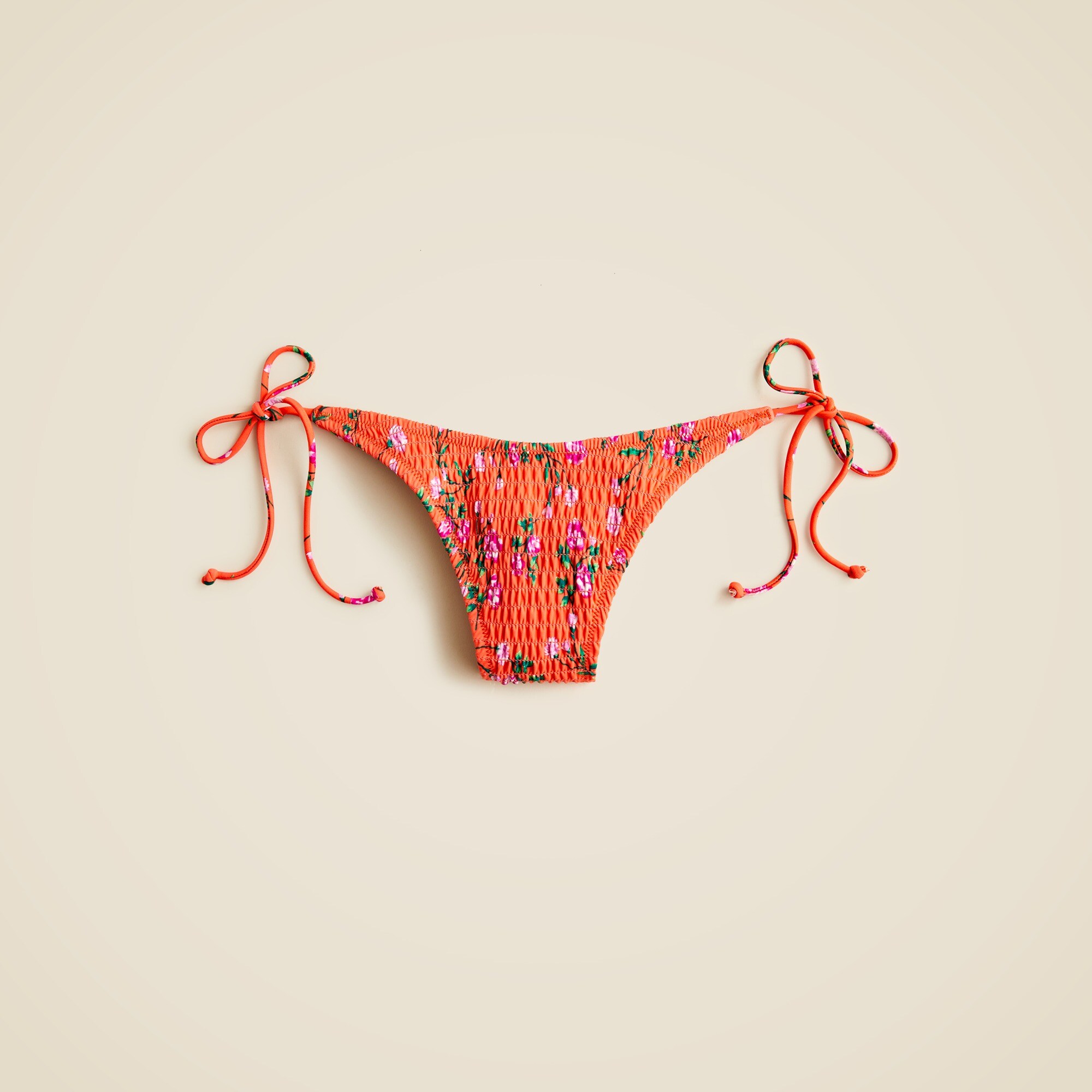 Smocked high-cut string bikini bottom in coral floral