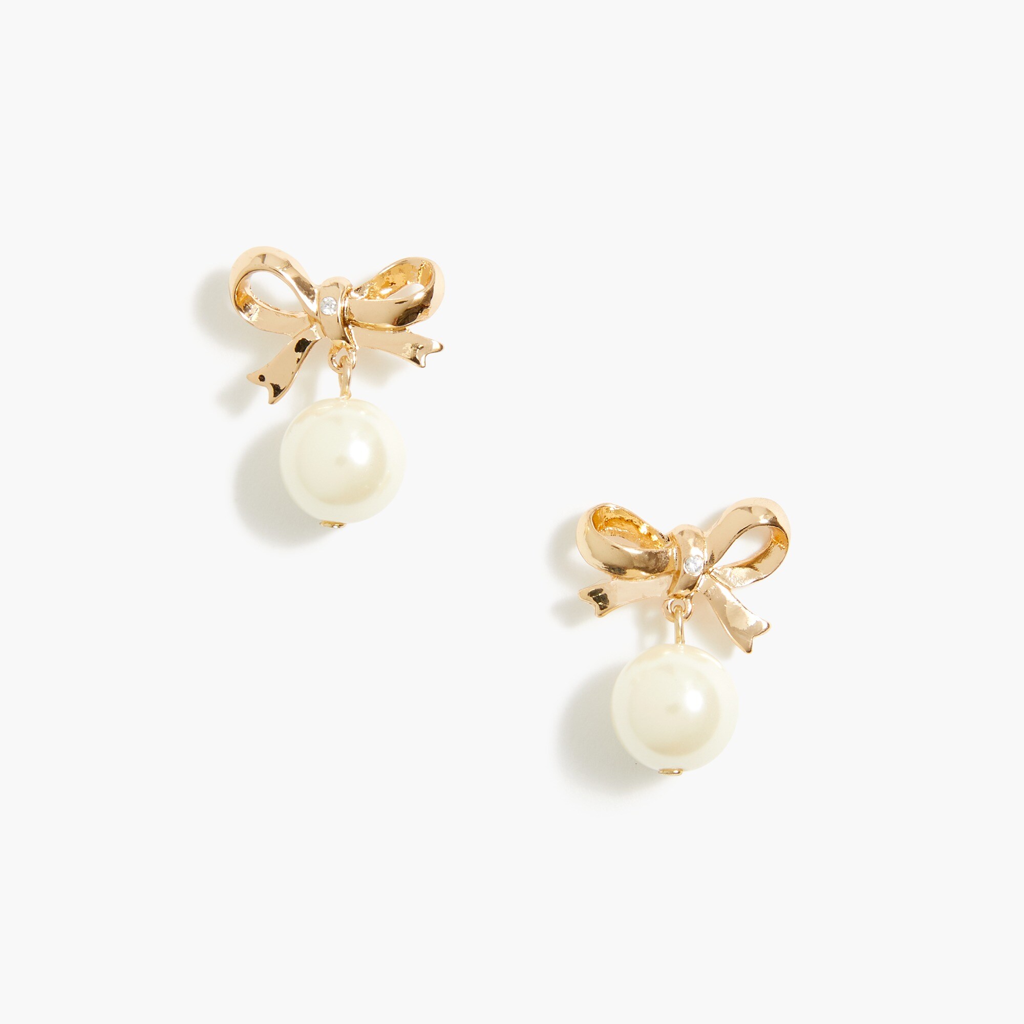 Gold bow and pearl statement earrings