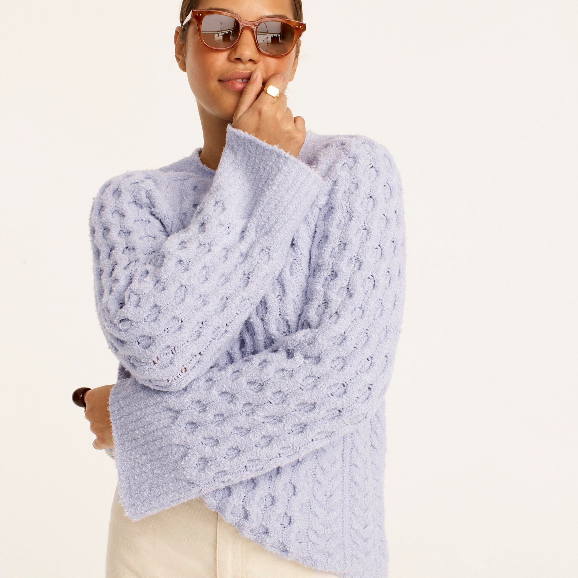 Cotton-blend bouclé cable-knit sweater
