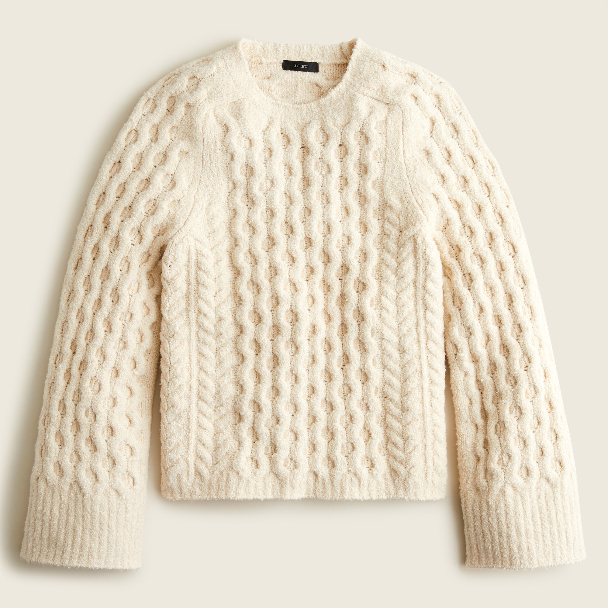 Cotton-blend bouclé cable-knit sweater