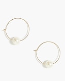 Hoop earrings with statement pearl