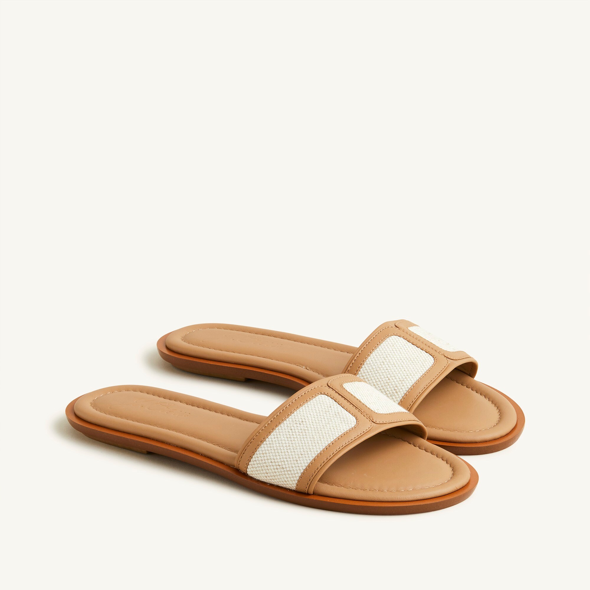 Slide sandals in canvas and leather