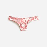 Curved-waist cheeky bikini bottom in tossed floral