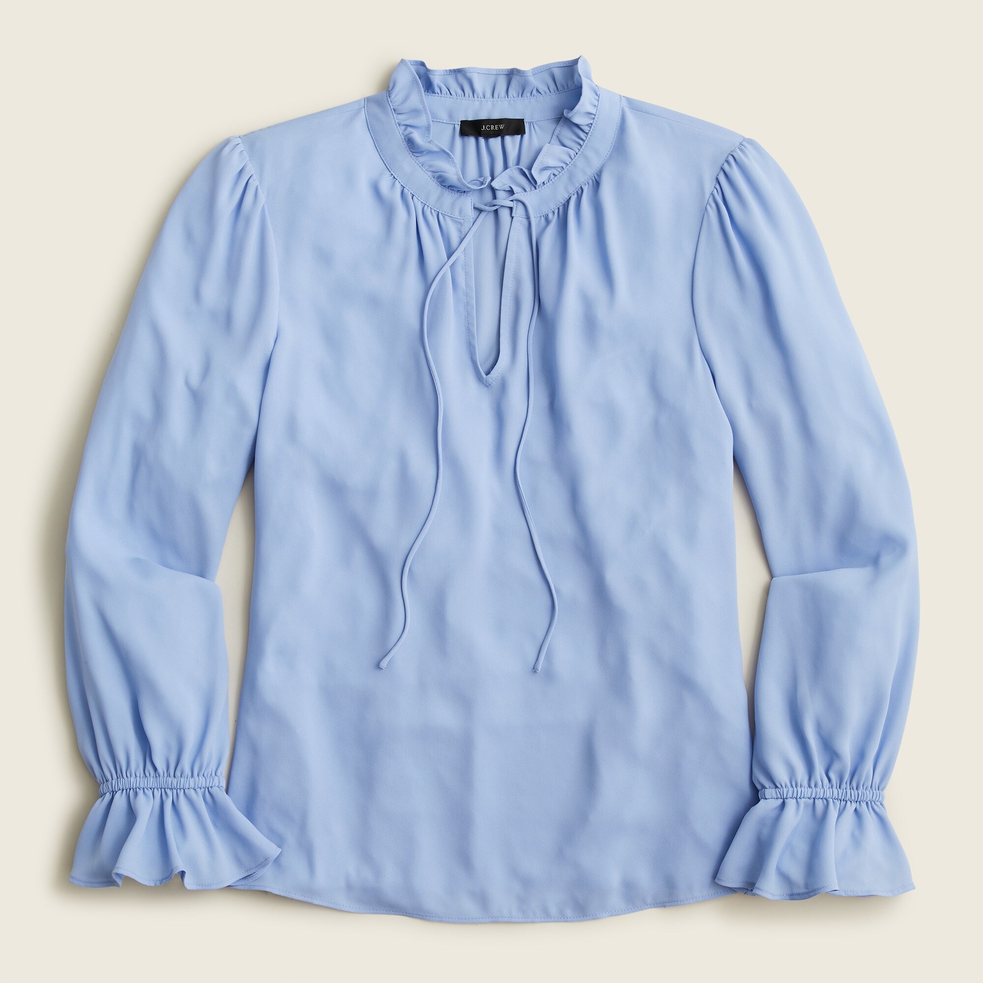 Drapey ruffle tie-neck top