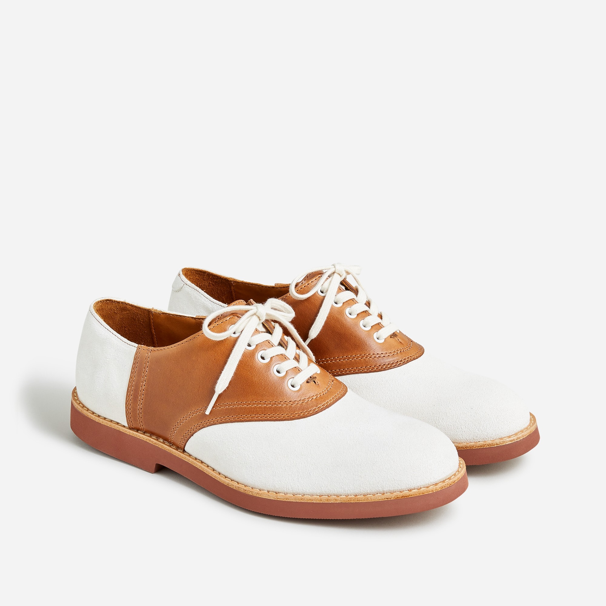 Saddle shoes in leather and English suede