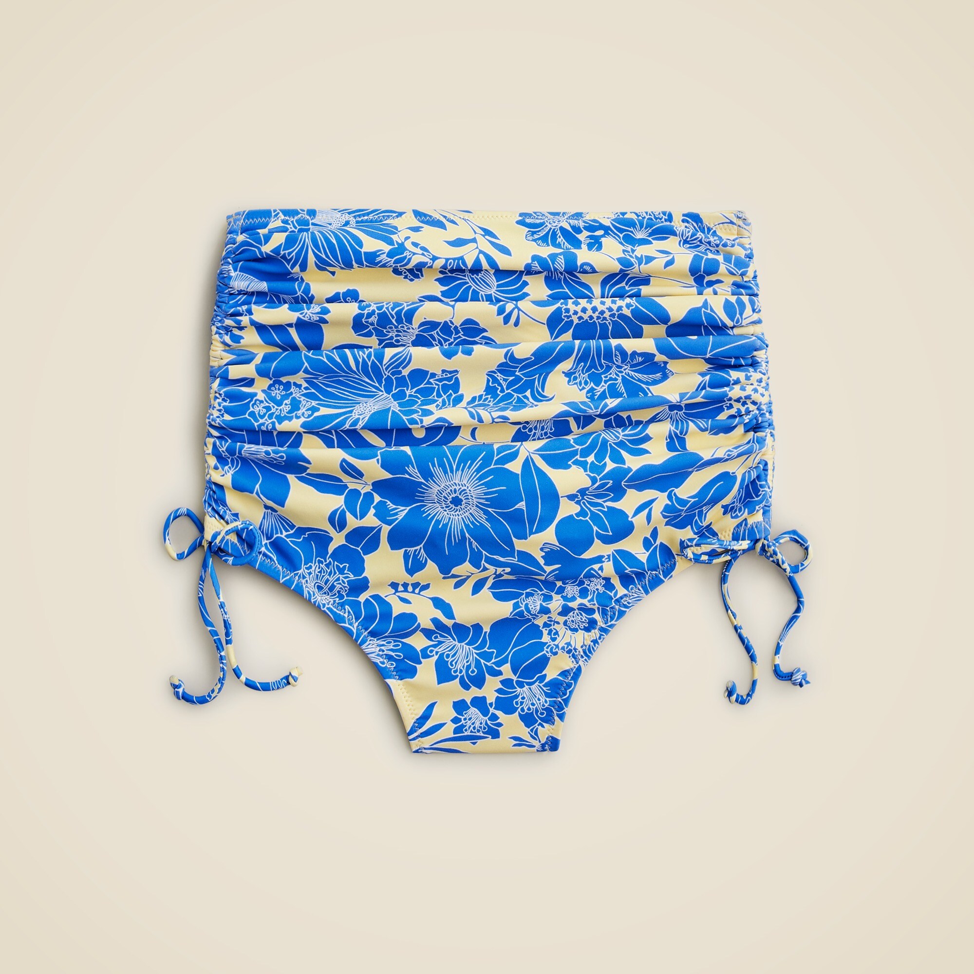 Ruched high-rise bikini bottom with side ties in blue floral