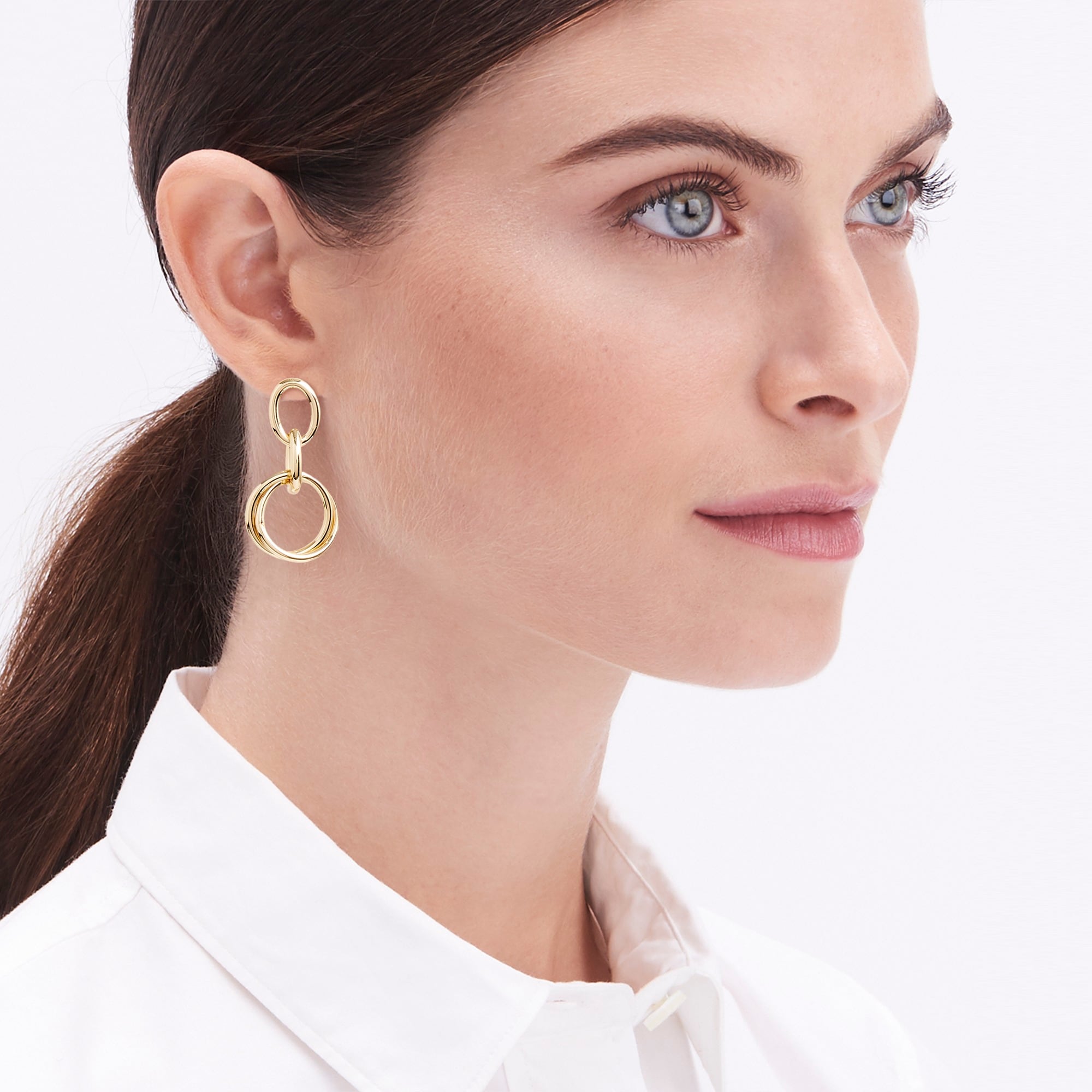 Gold link statement earrings