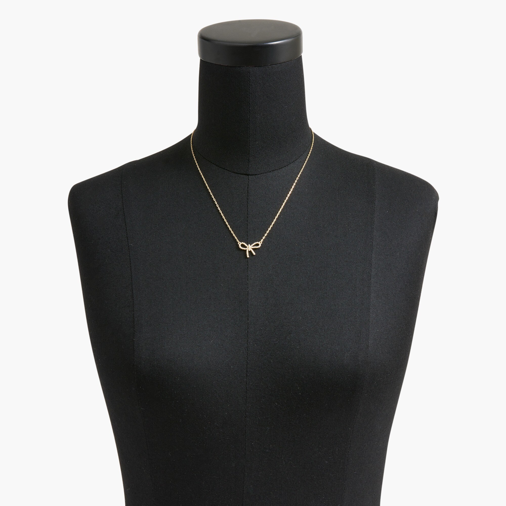 Tiny bow pendant necklace