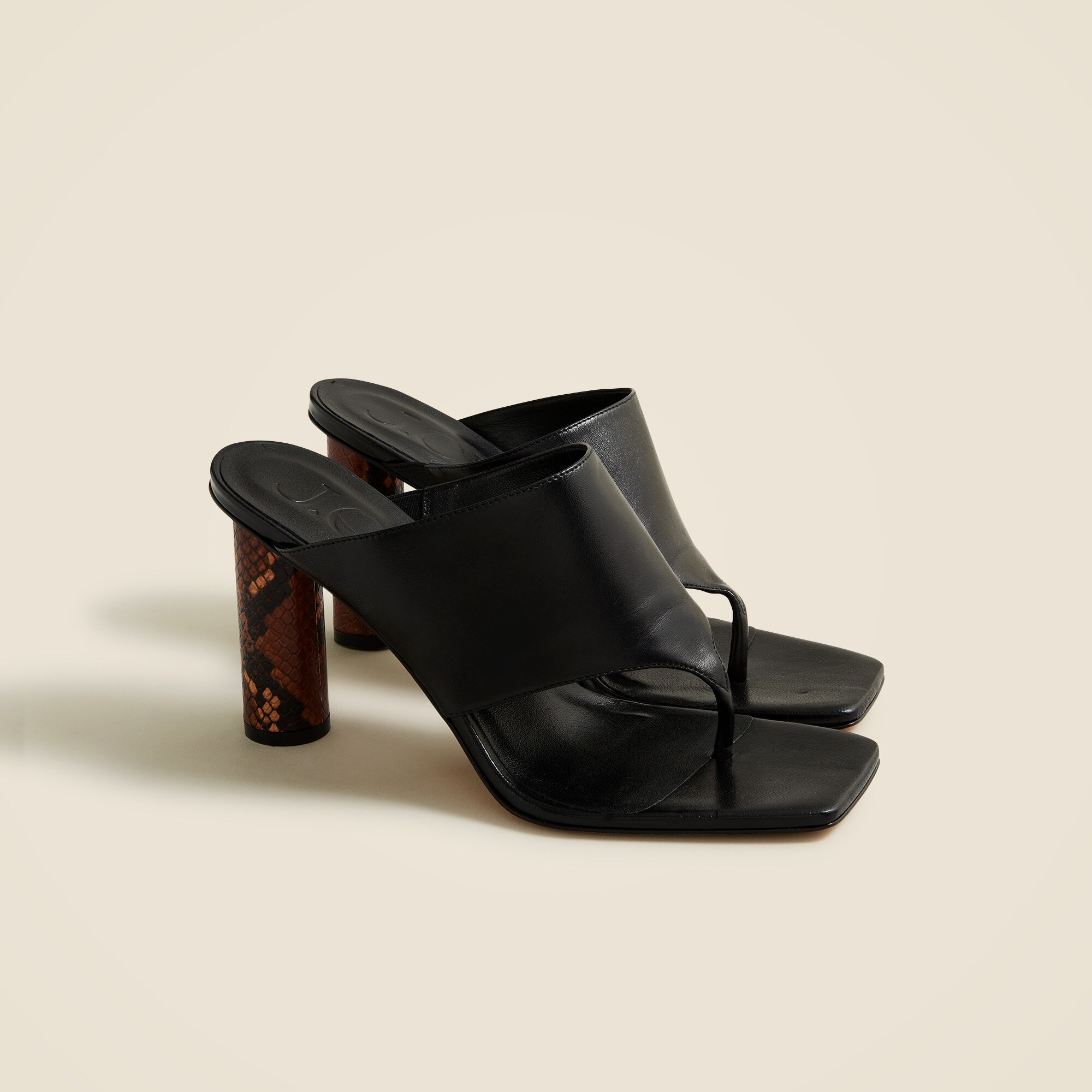 Rounded-heel thong sandals in leather