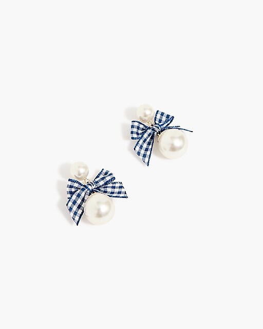  Pearl and bow statement earrings