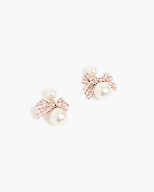  Pearl and bow statement earrings