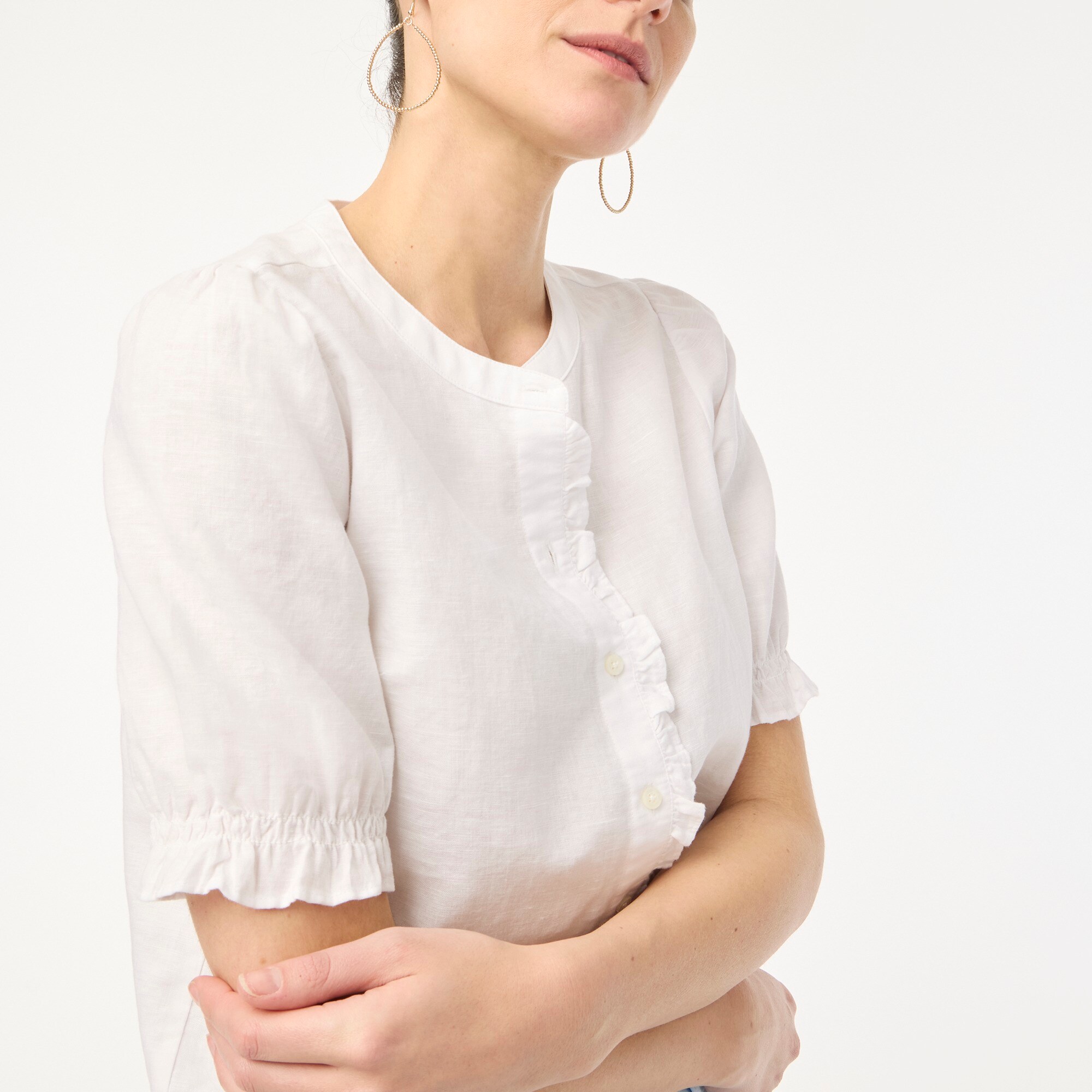  Linen-blend ruffle top with puff sleeves