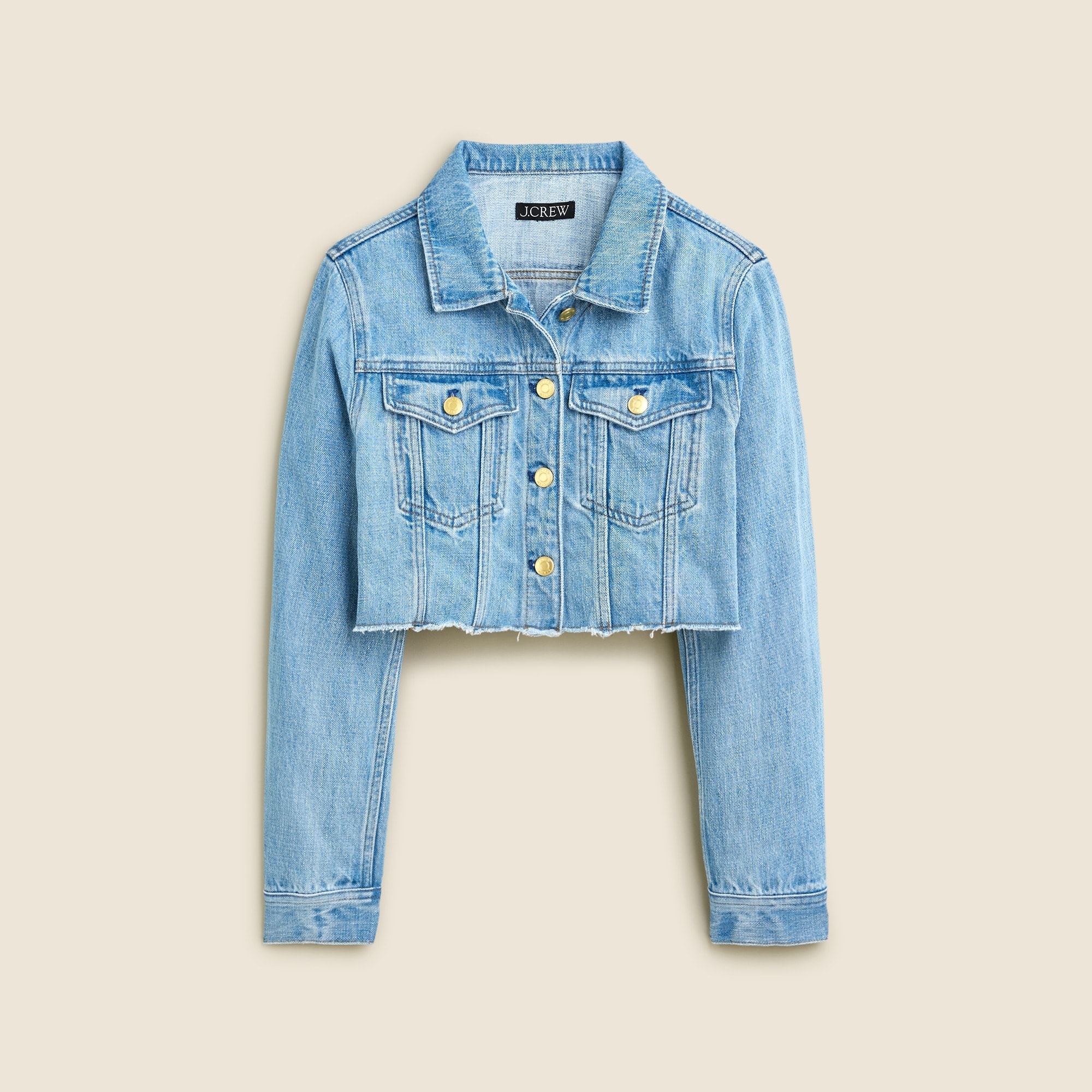 Cut-off denim jacket in Medium Indigo wash