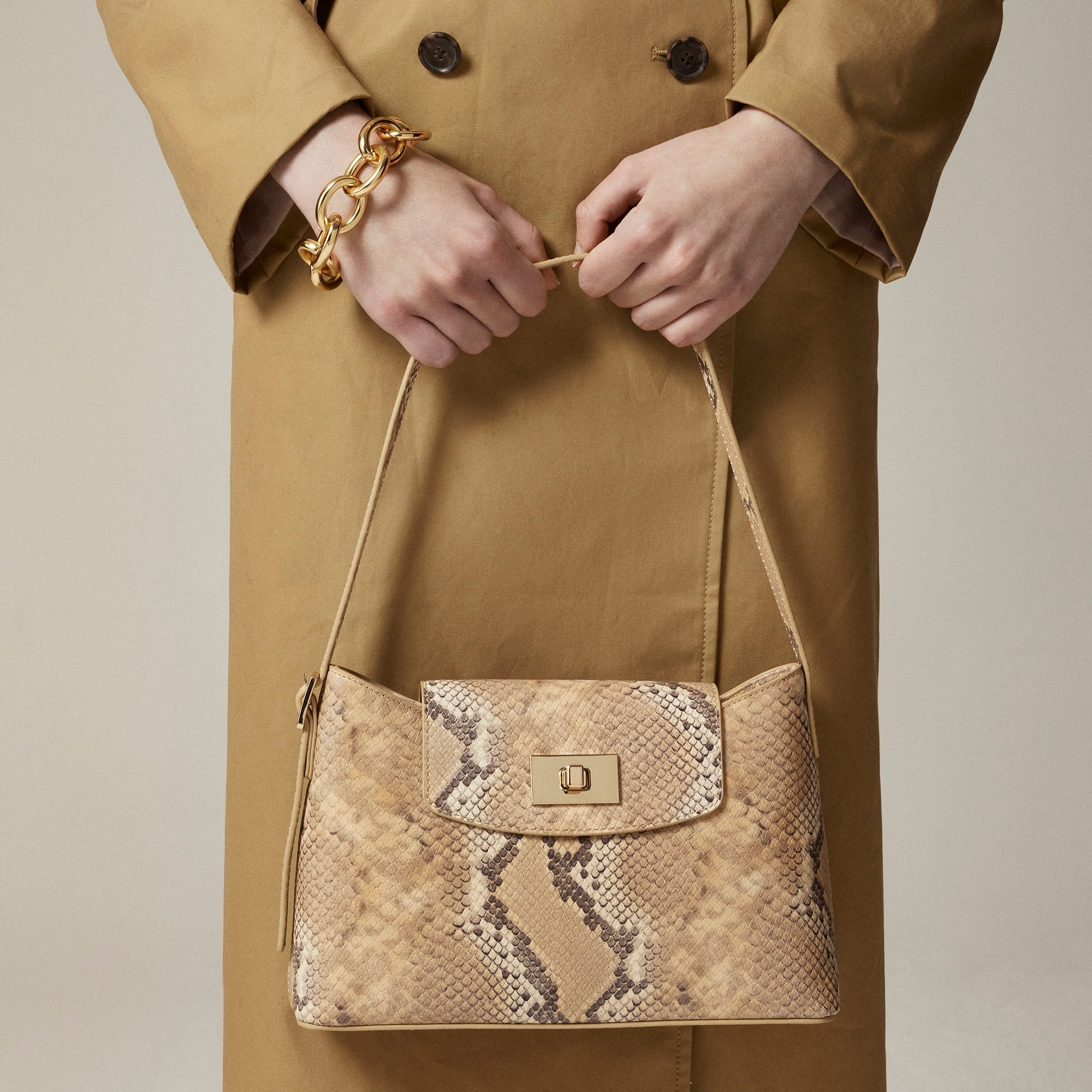 womens Edie shoulder bag in snake-embossed Italian leather