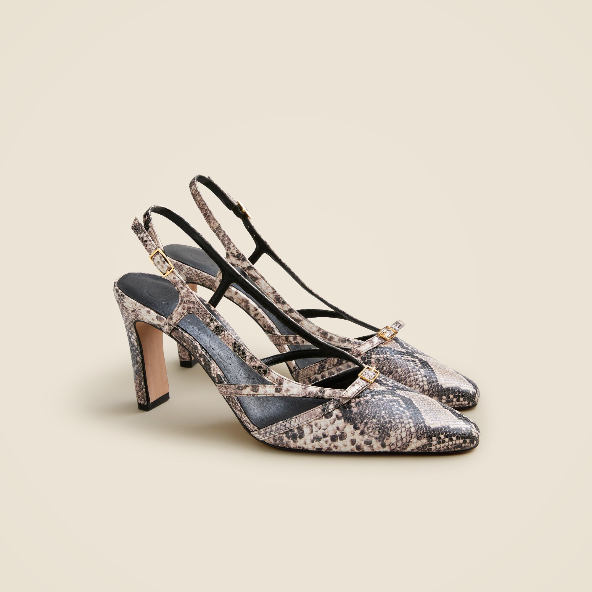Made-in-Spain Jules slingback pumps in snake-embossed leather
