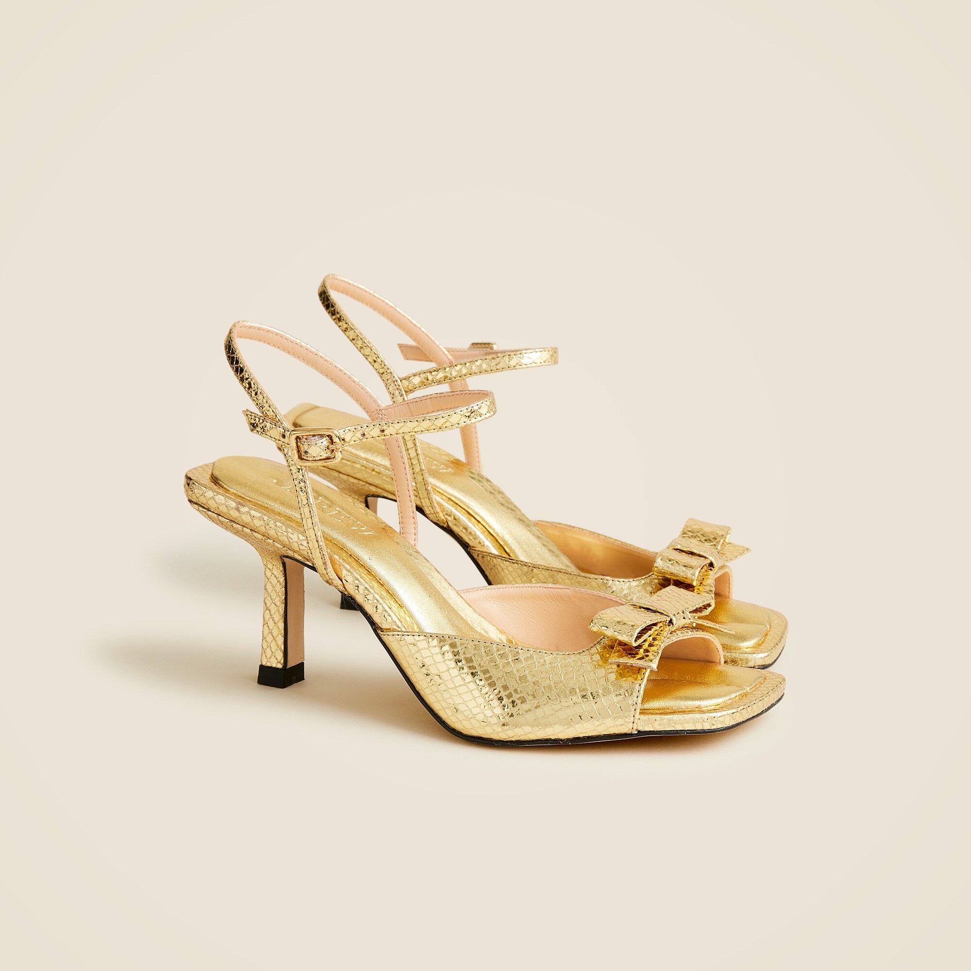Leni made-in-Spain bow heels in metallic snake-embossed leather