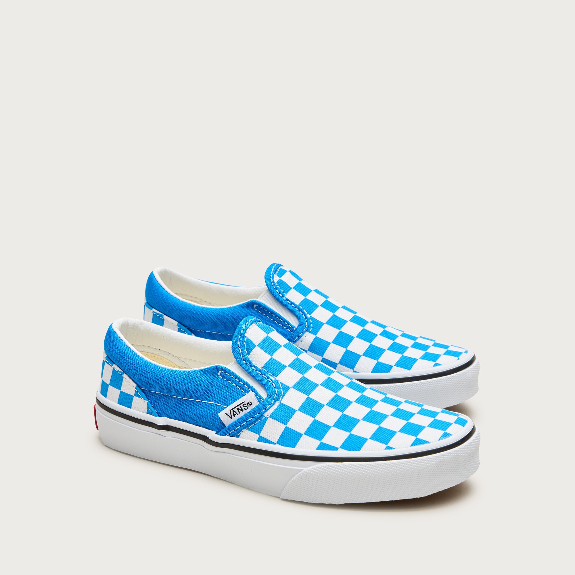 boys Vans&reg; kids' classic slip-on sneakers in checkerboard