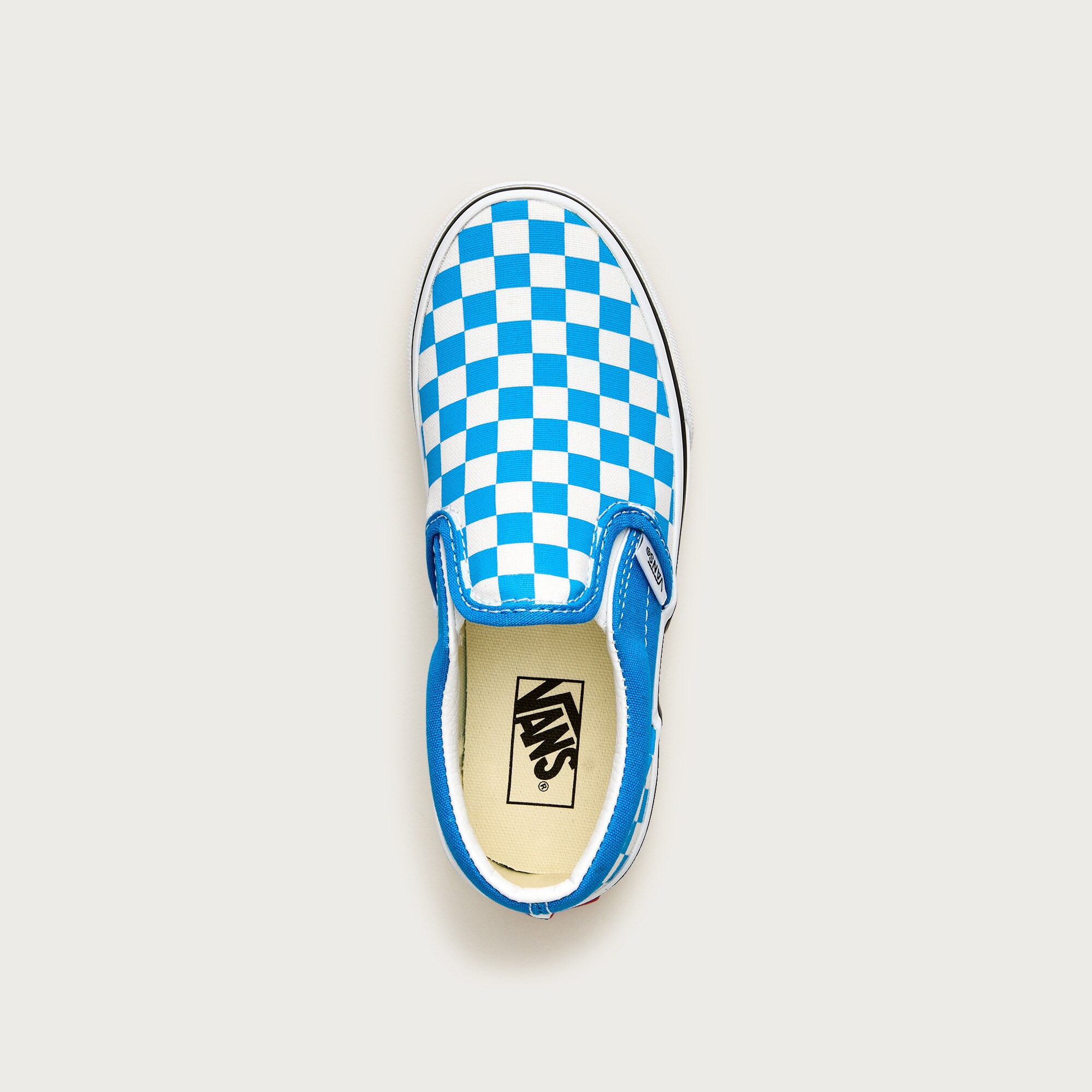 Vans® kids' classic slip-on sneakers in checkerboard