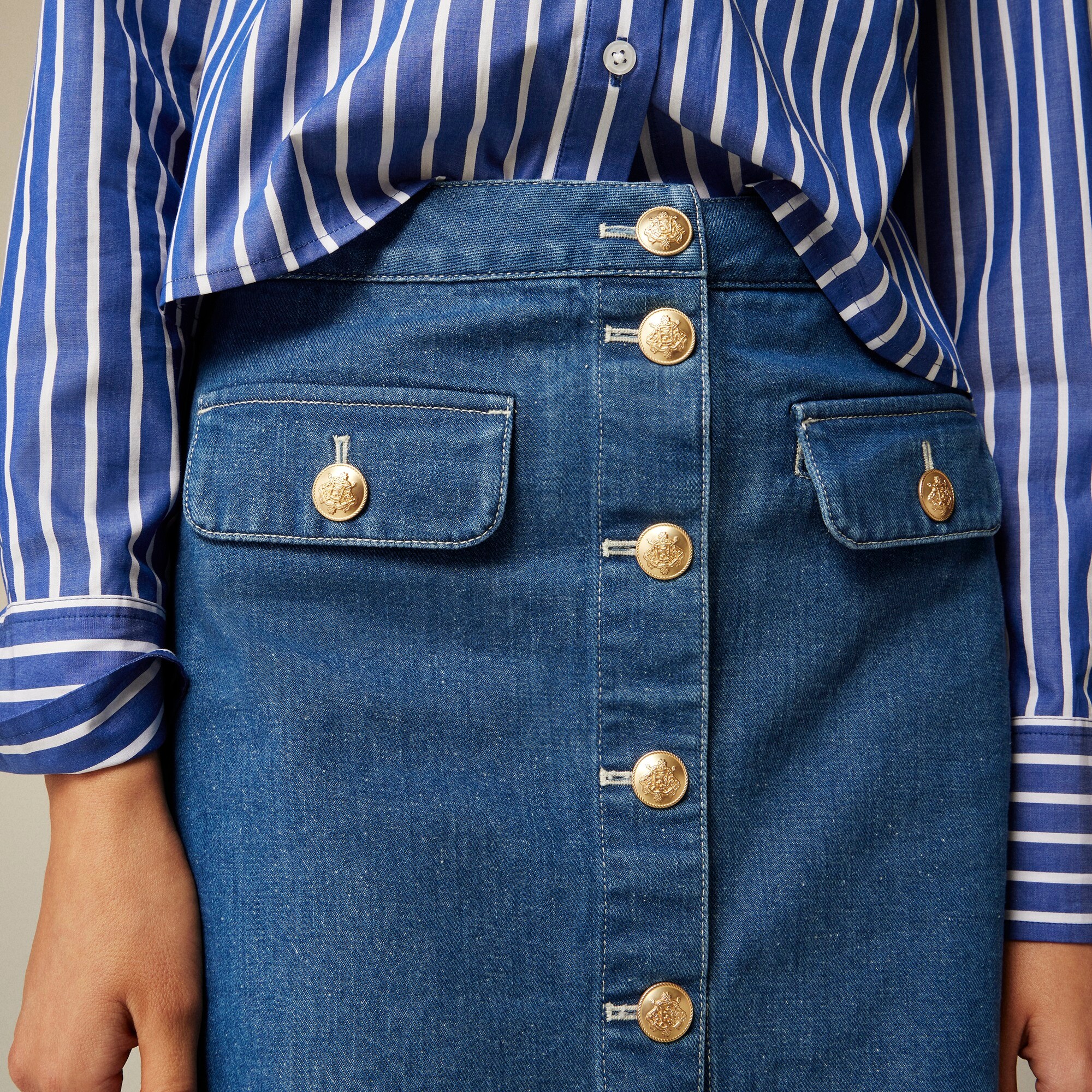 Button-front denim mini skirt