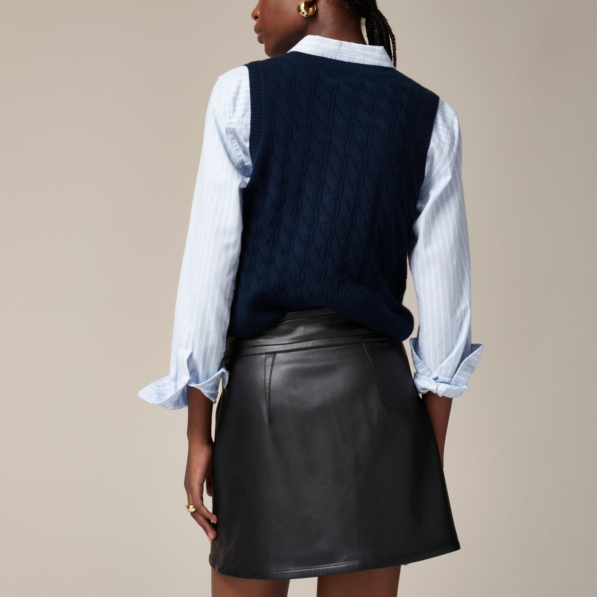 Center-pleat mini skirt in faux leather
