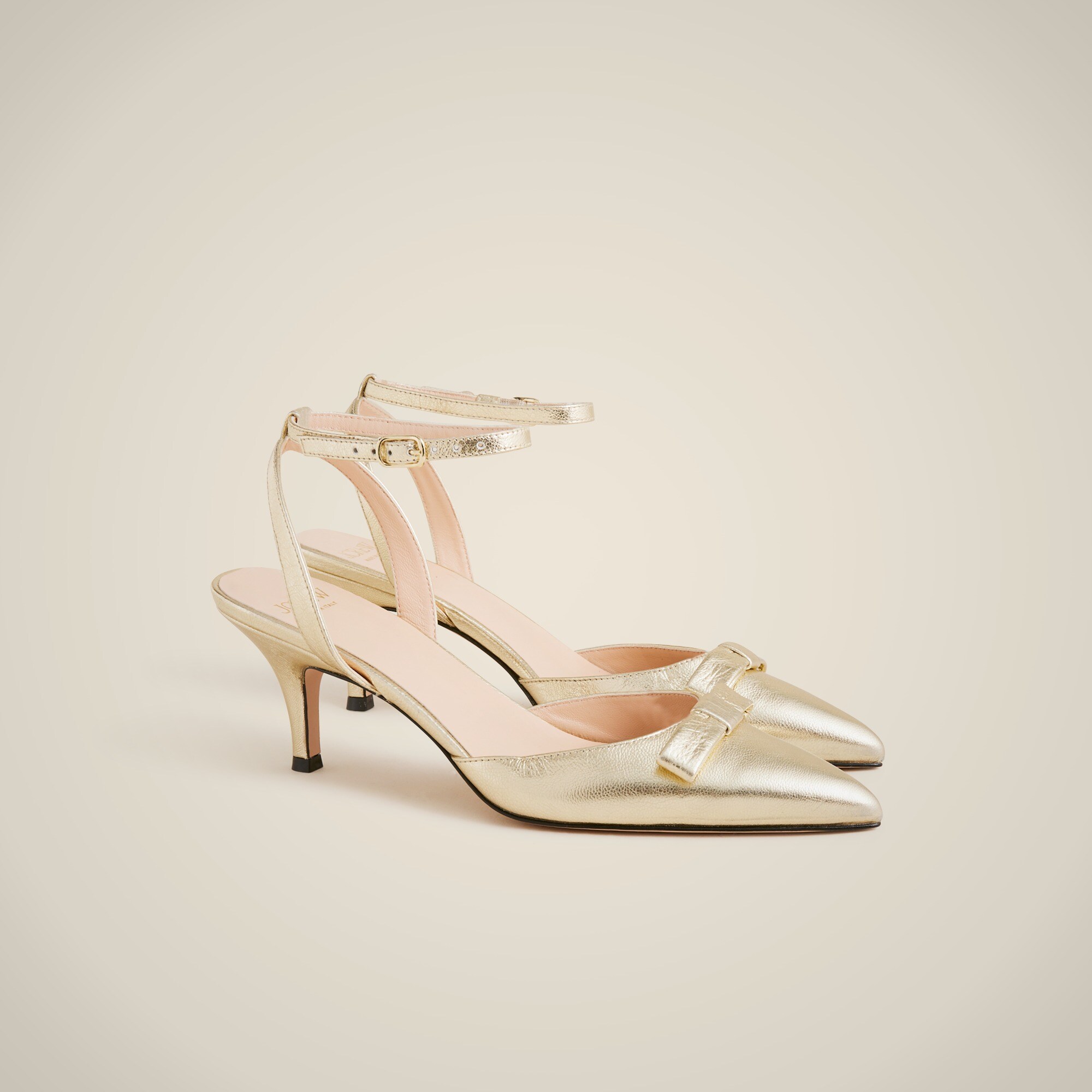 Made-in-Italy Colette bow pumps in metallic crinkle leather