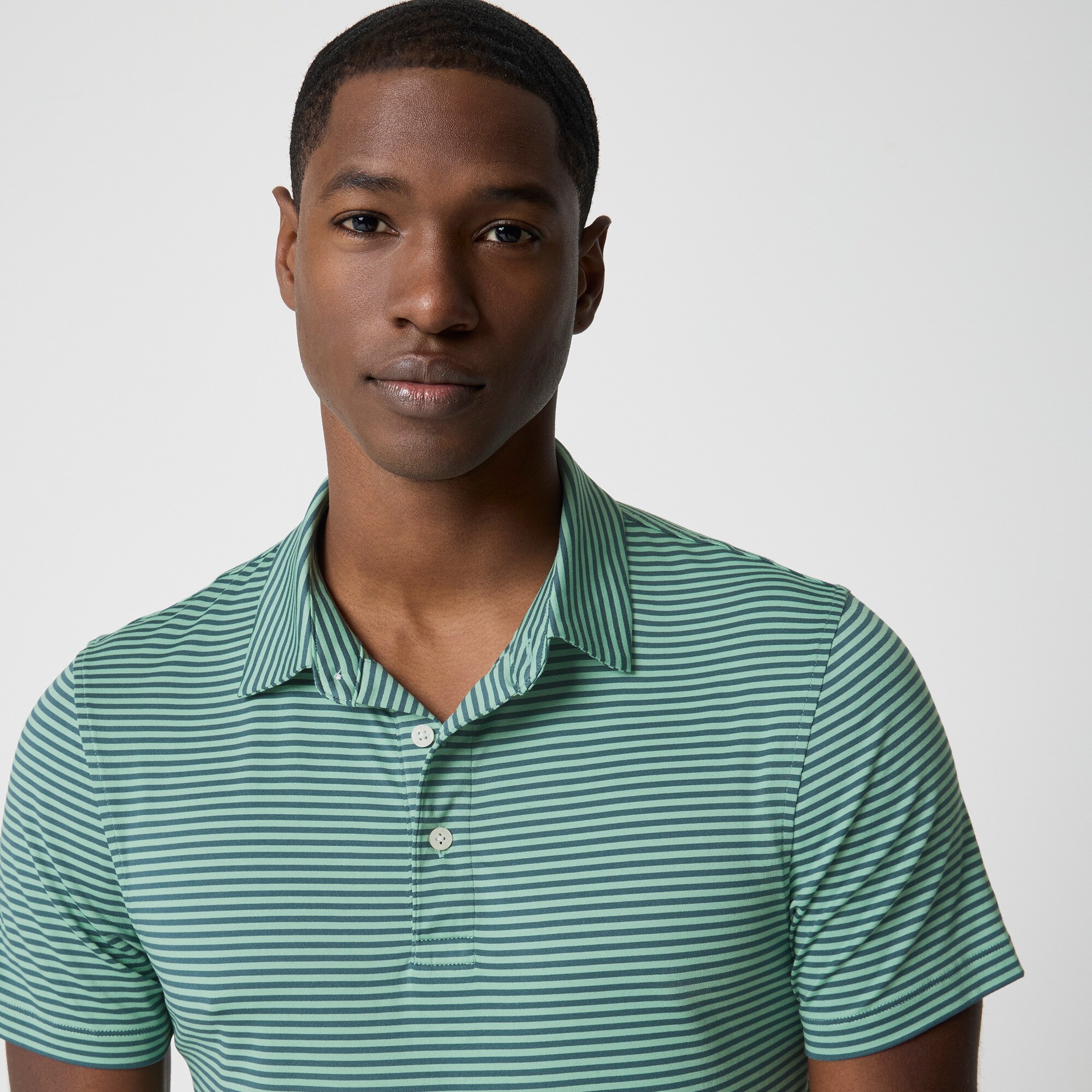 Striped performance polo shirt
