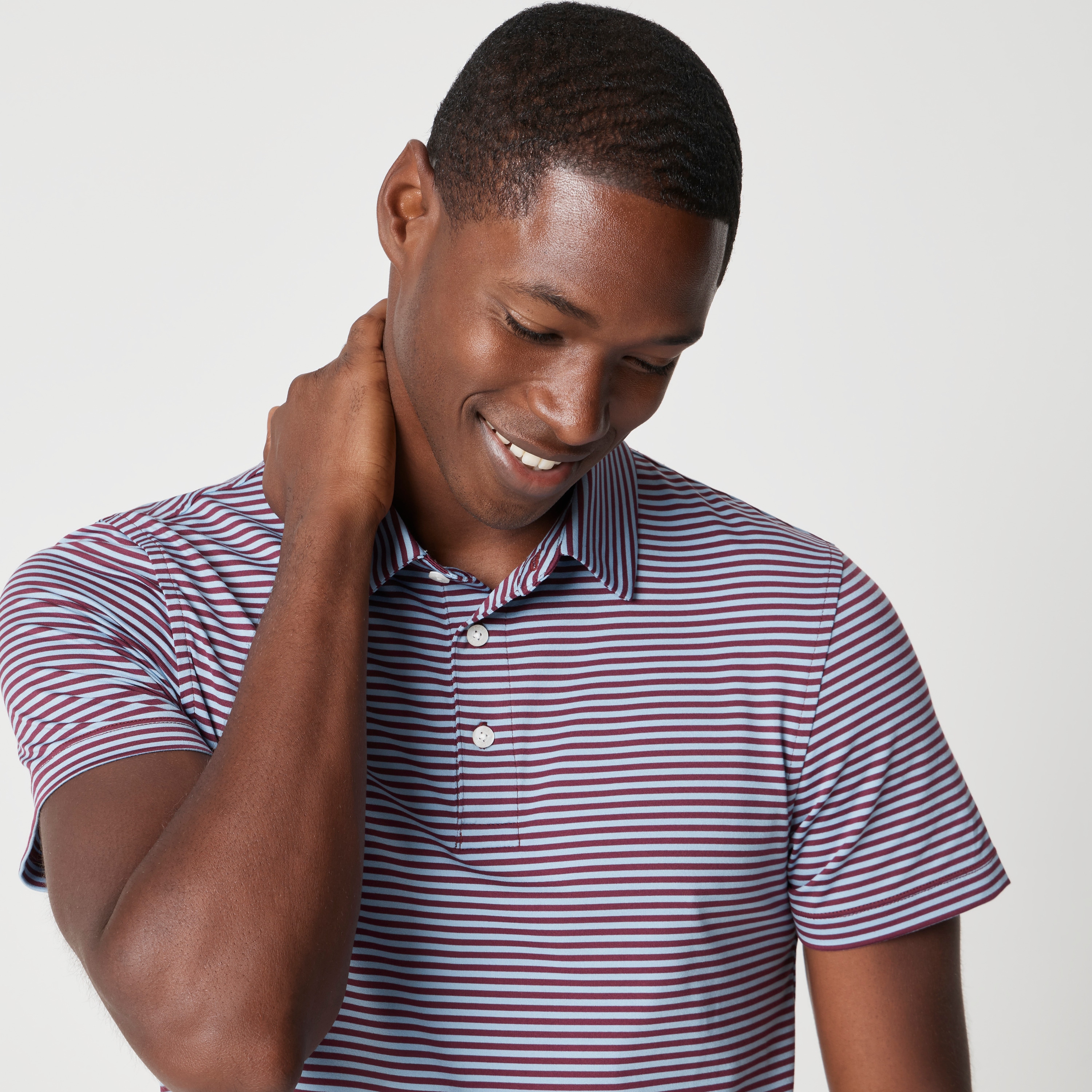 Striped performance polo shirt