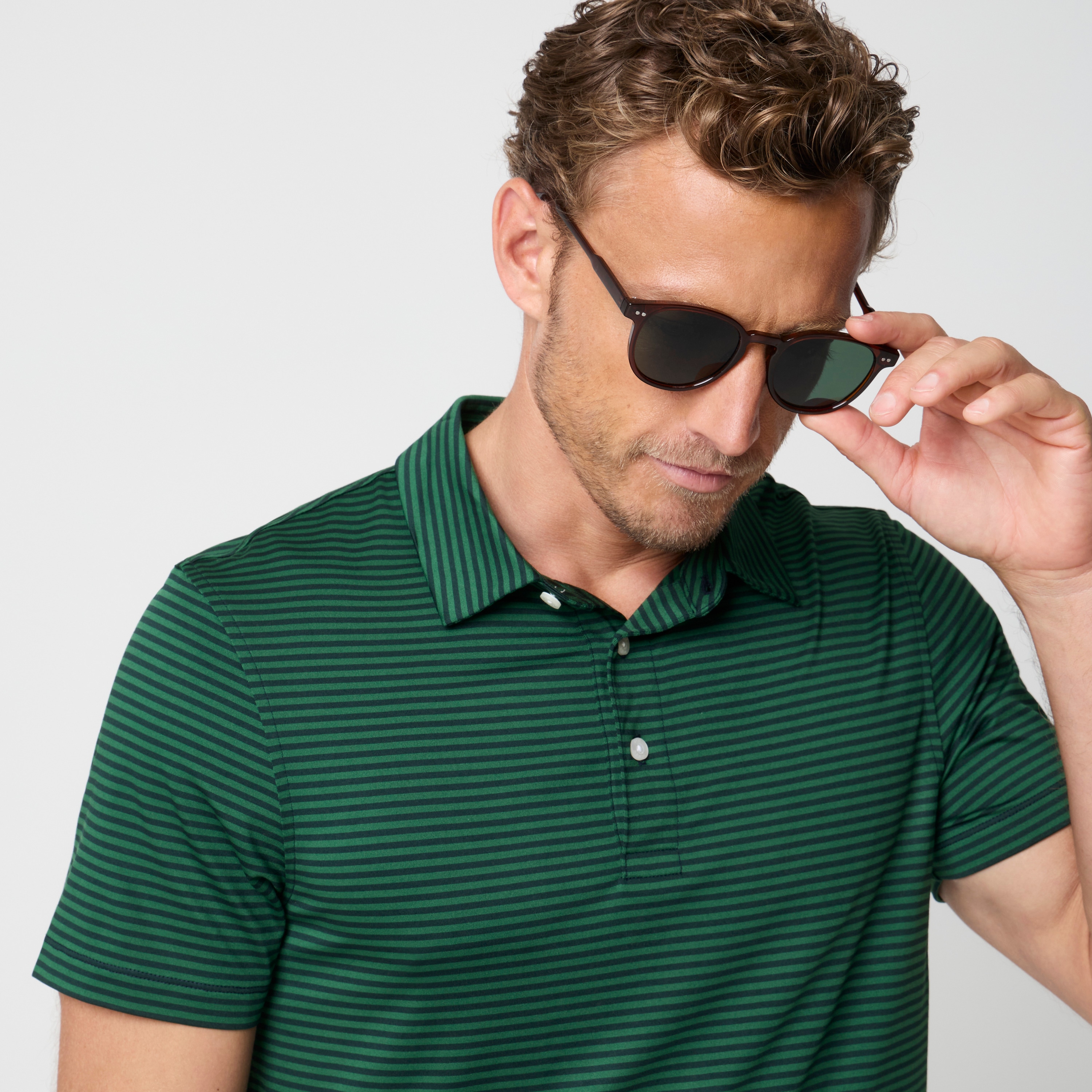 Striped performance polo shirt