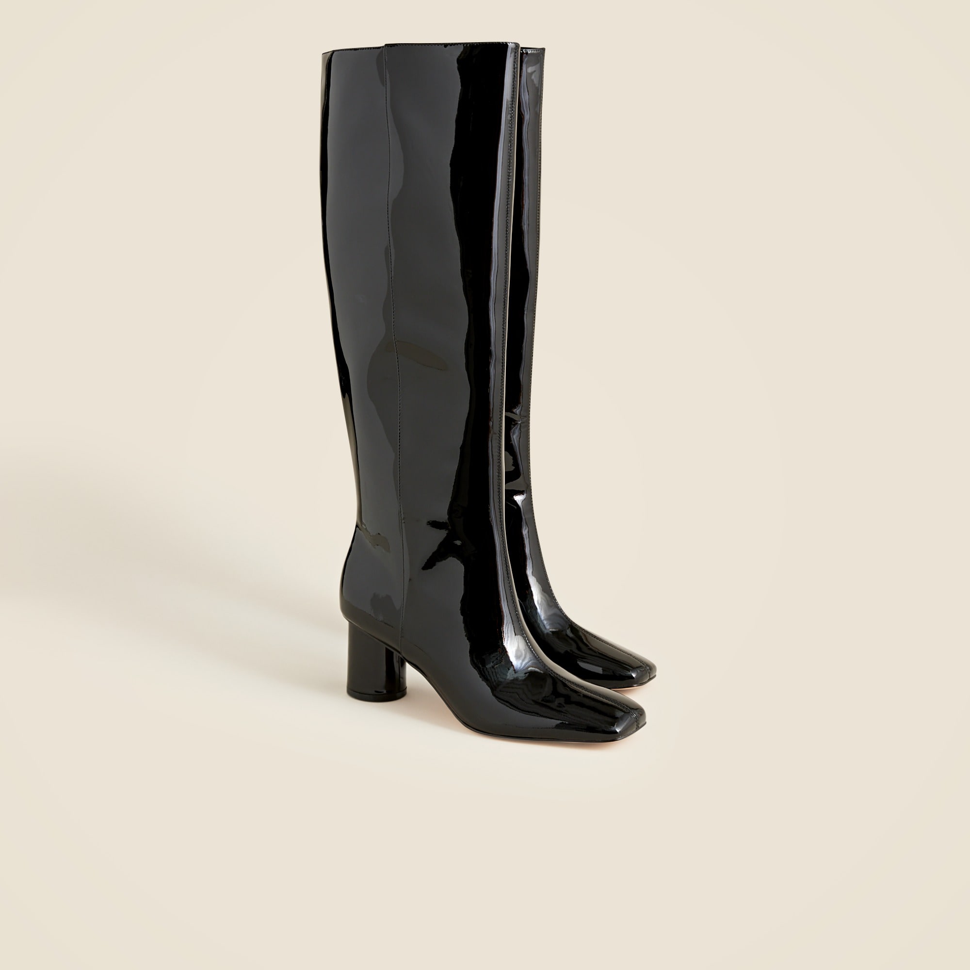 Knee-high round-heel boots in patent leather