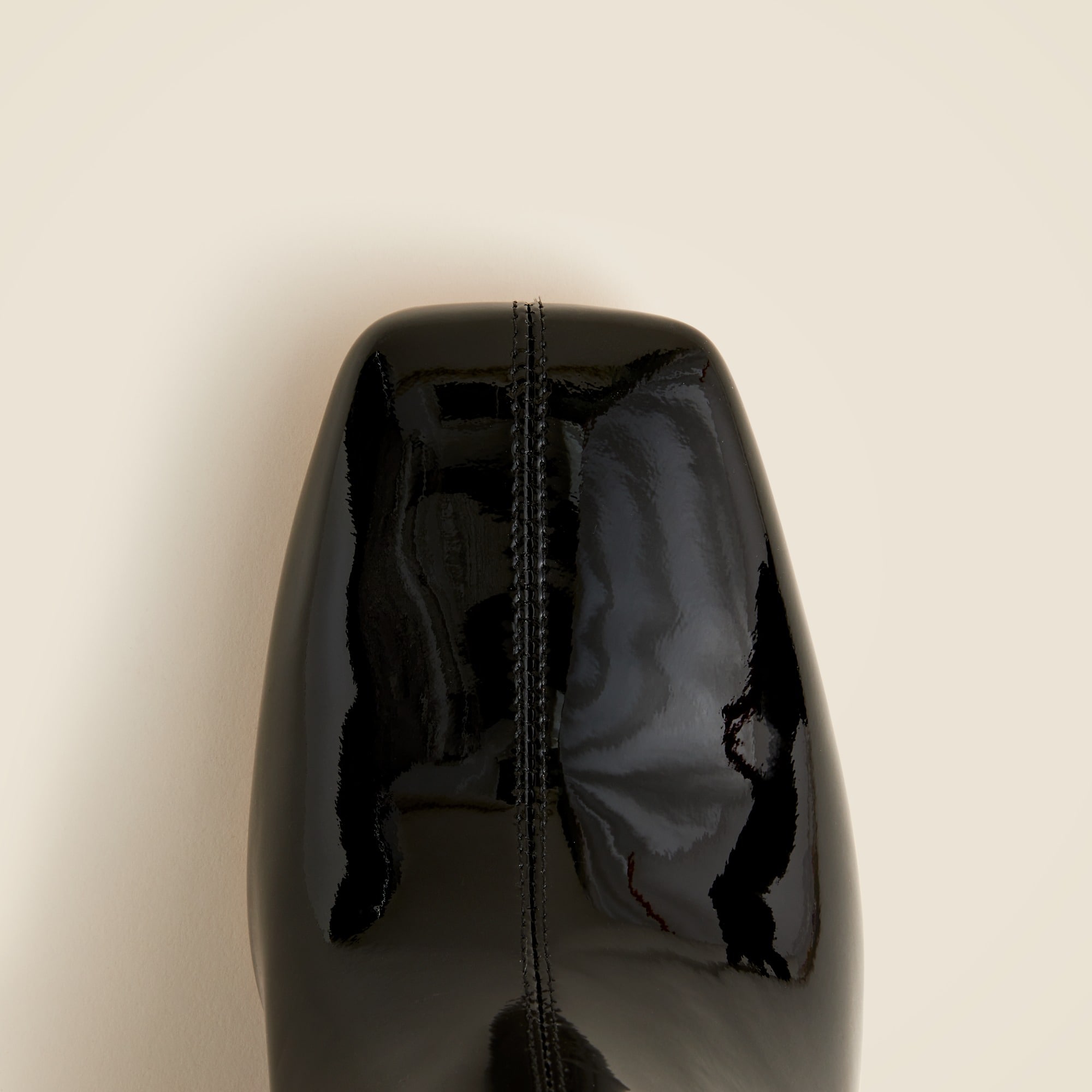 Knee-high round-heel boots in patent leather
