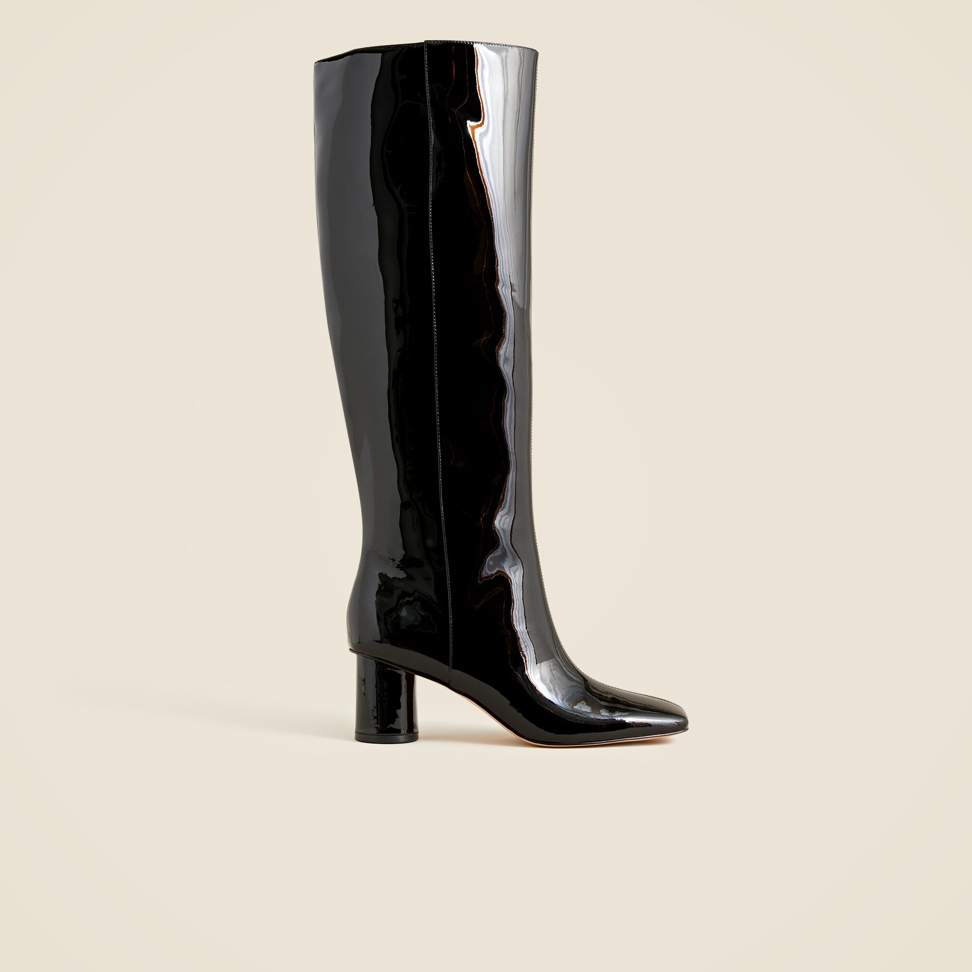 Knee-high round-heel boots in patent leather