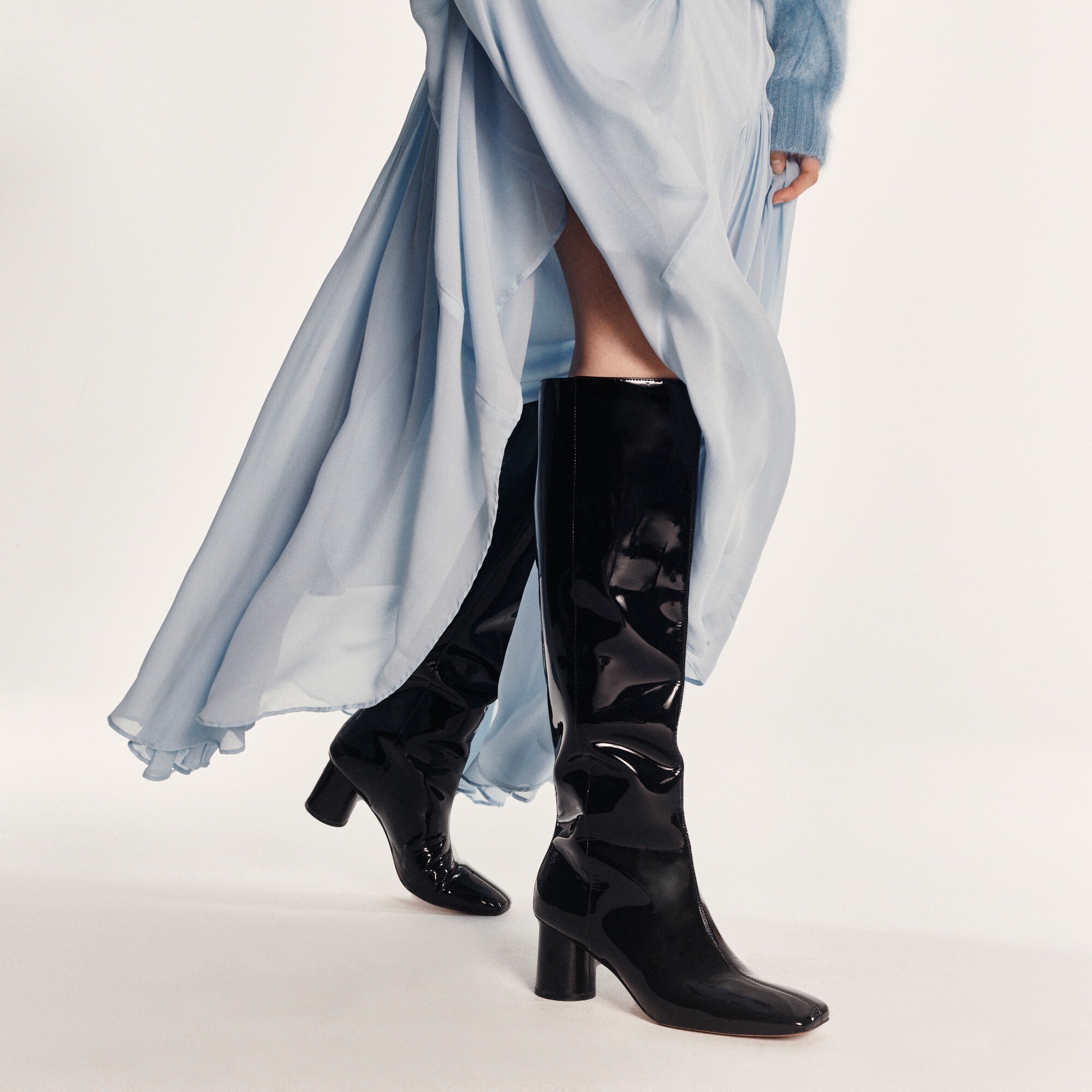 Knee-high round-heel boots in patent leather