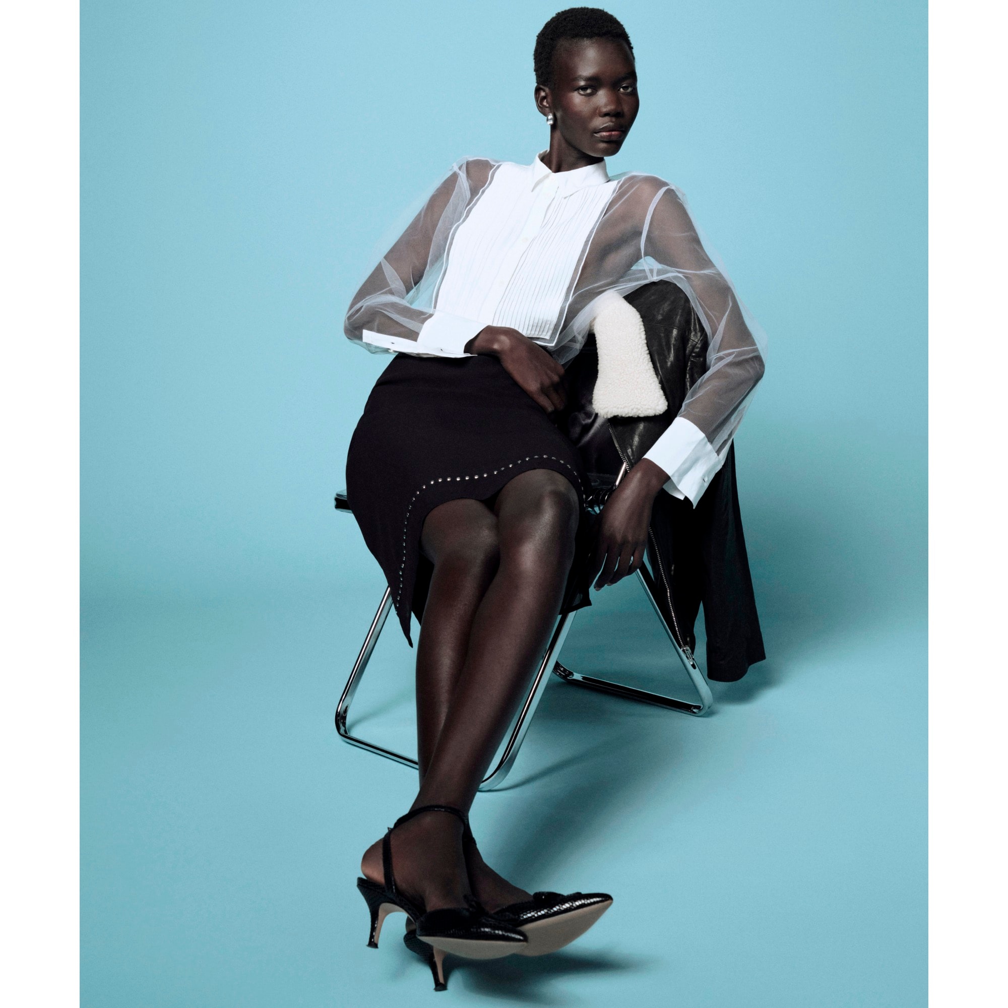 Sheer knee-length skirt with studded trim