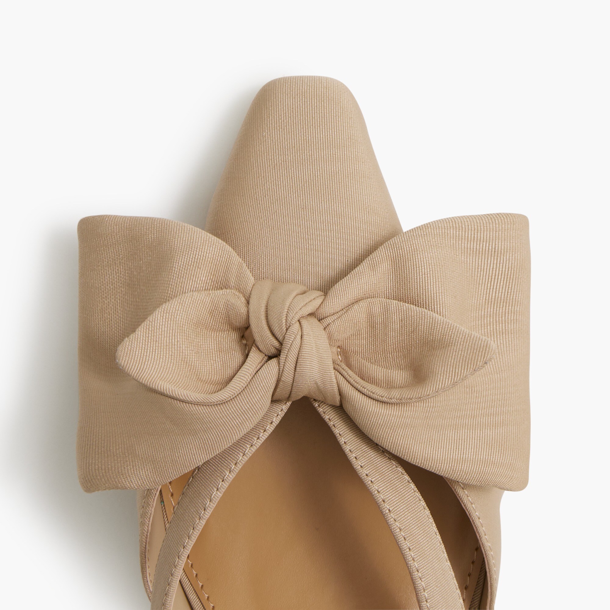 Bow heeled mules