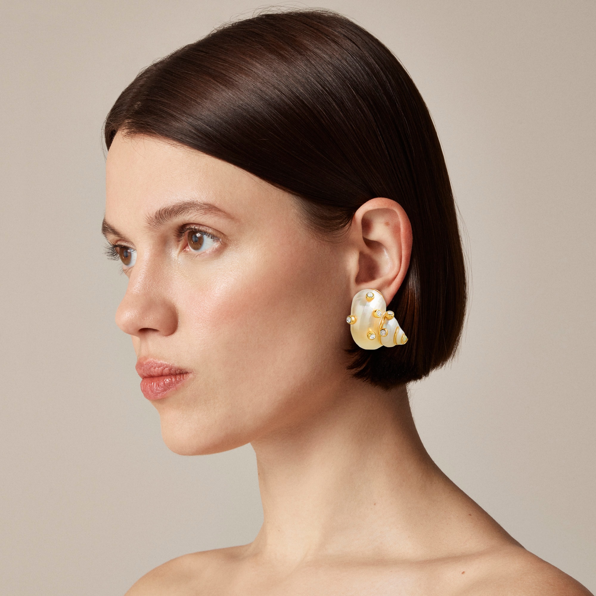 Seashell stud earrings with crystals