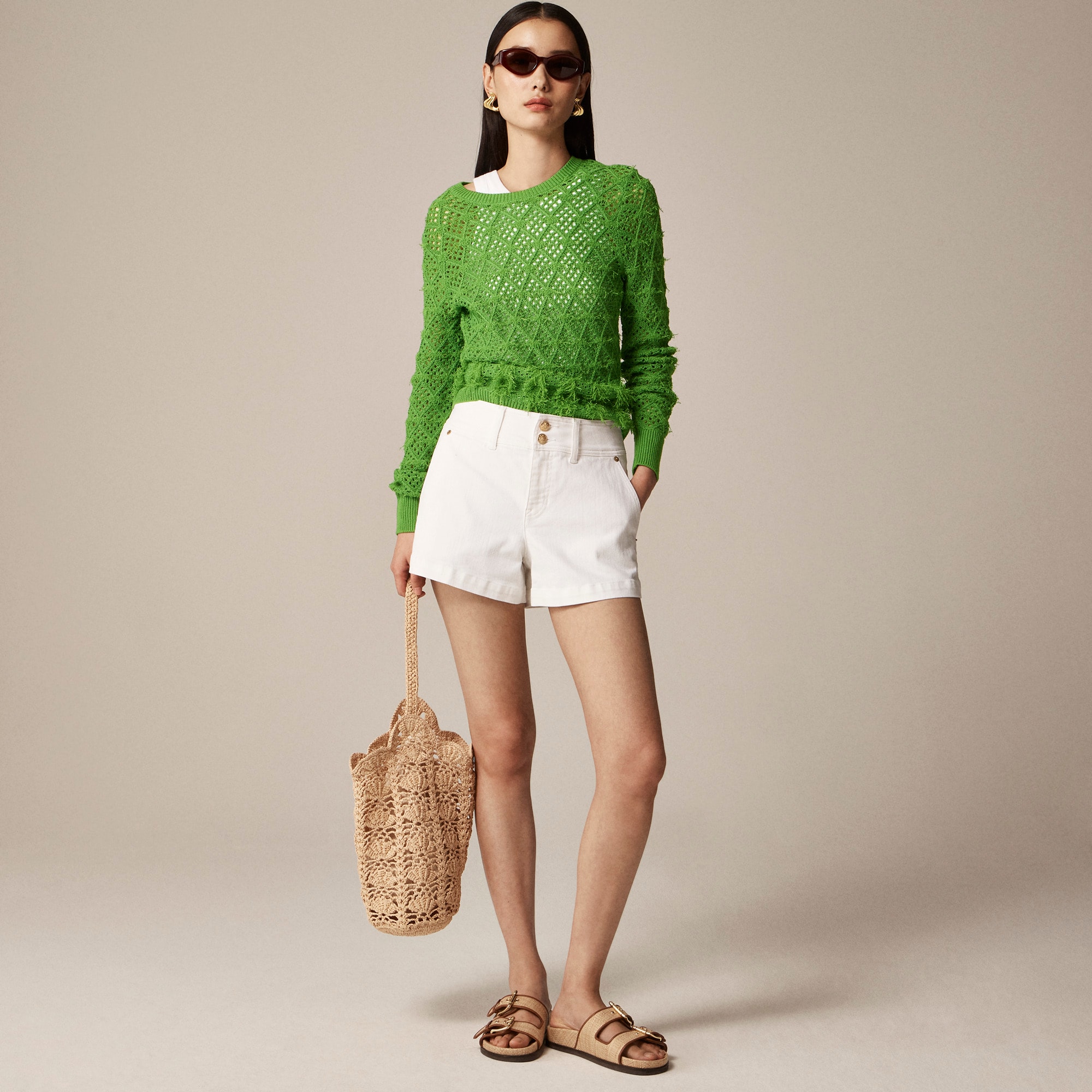 Pointelle crewneck sweater with fringe