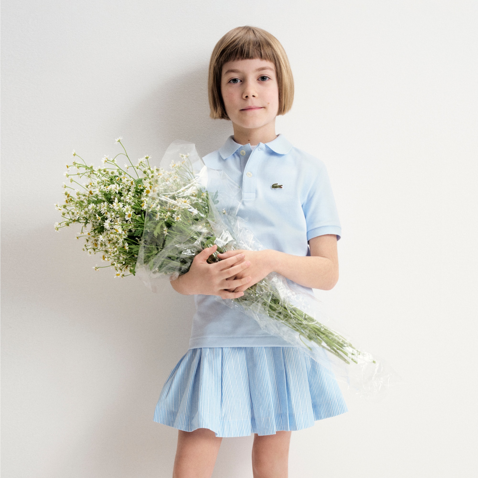  Girls' pleated skirt in cotton poplin with metallic threads