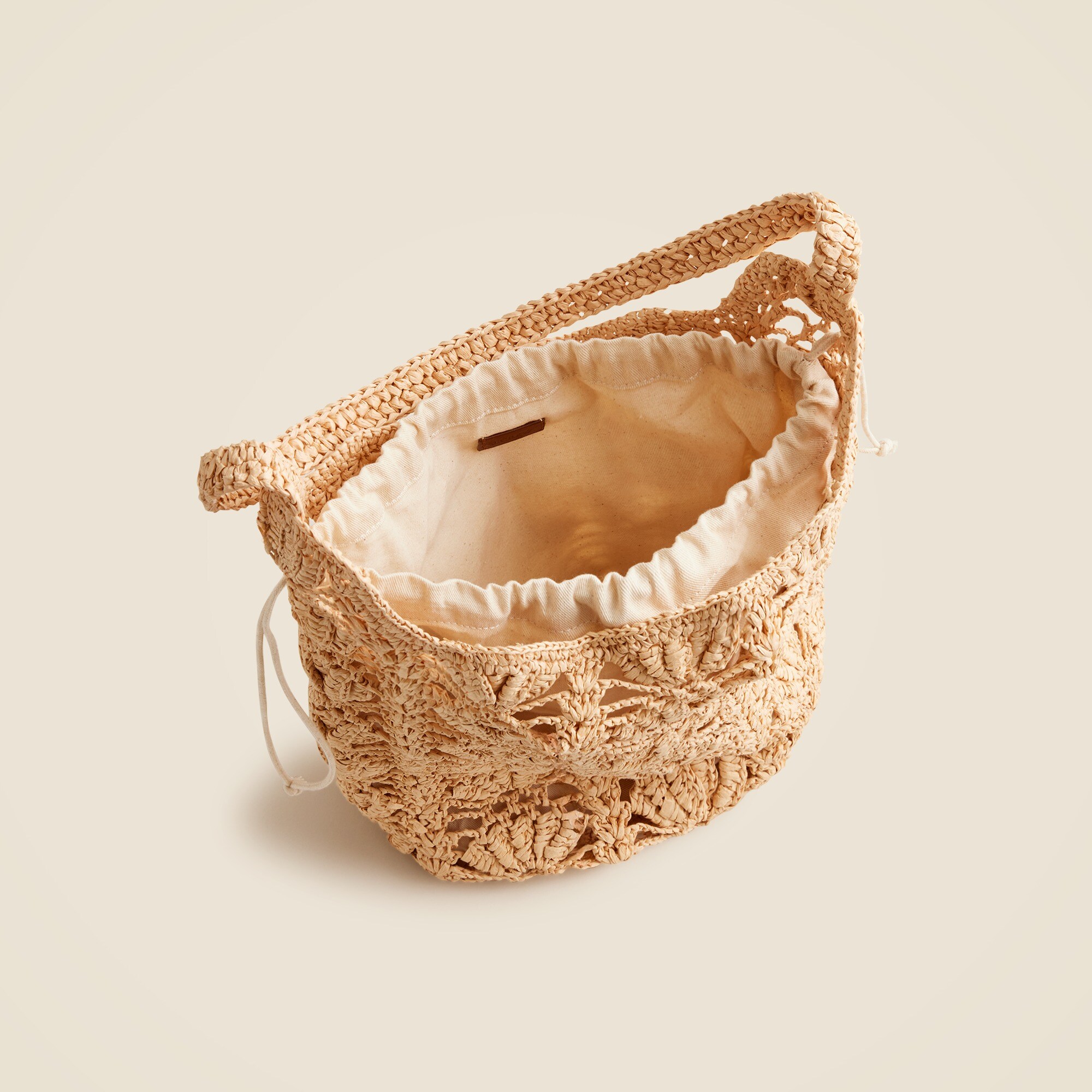 Handknotted faux-raffia bucket bag