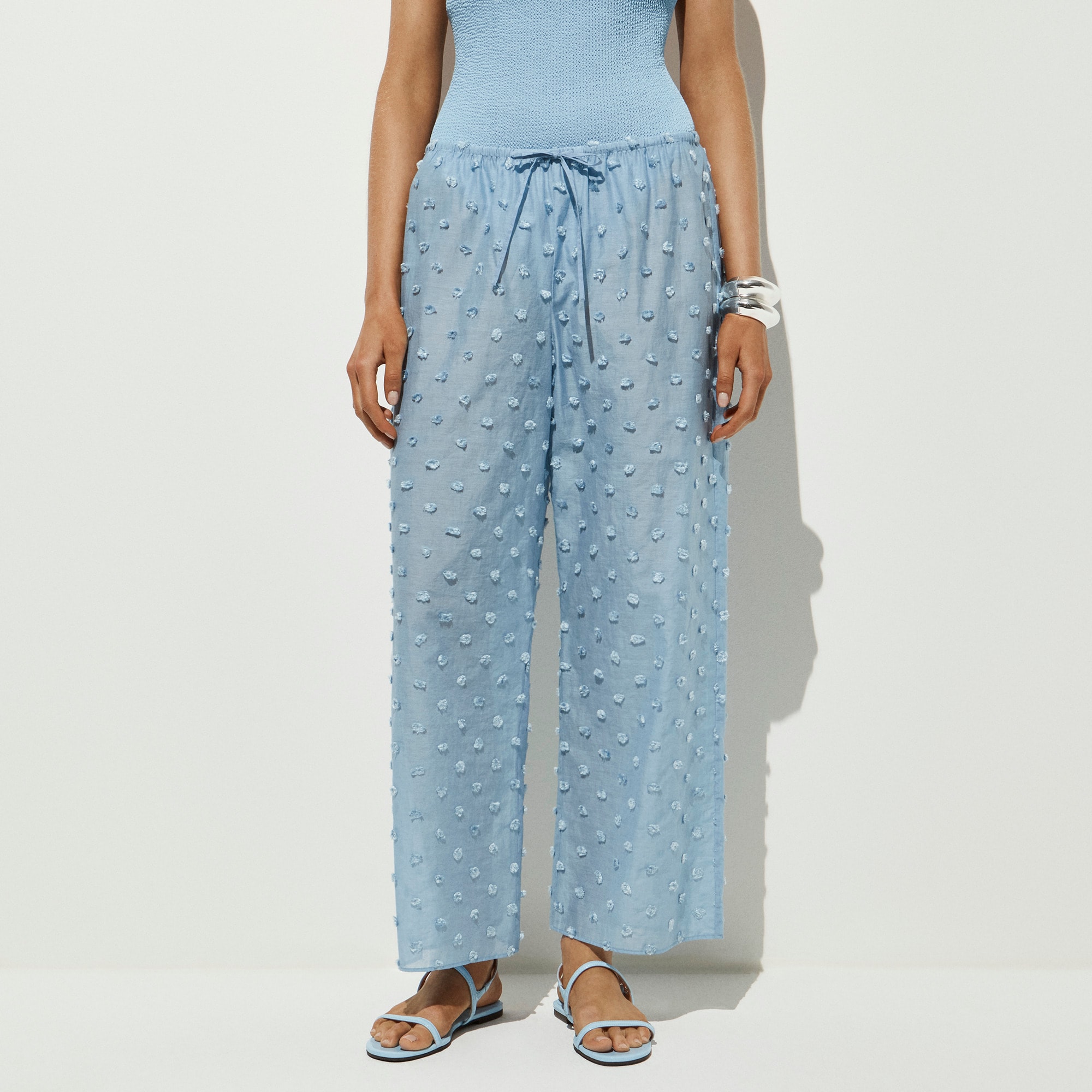 Beach pant with pom-poms