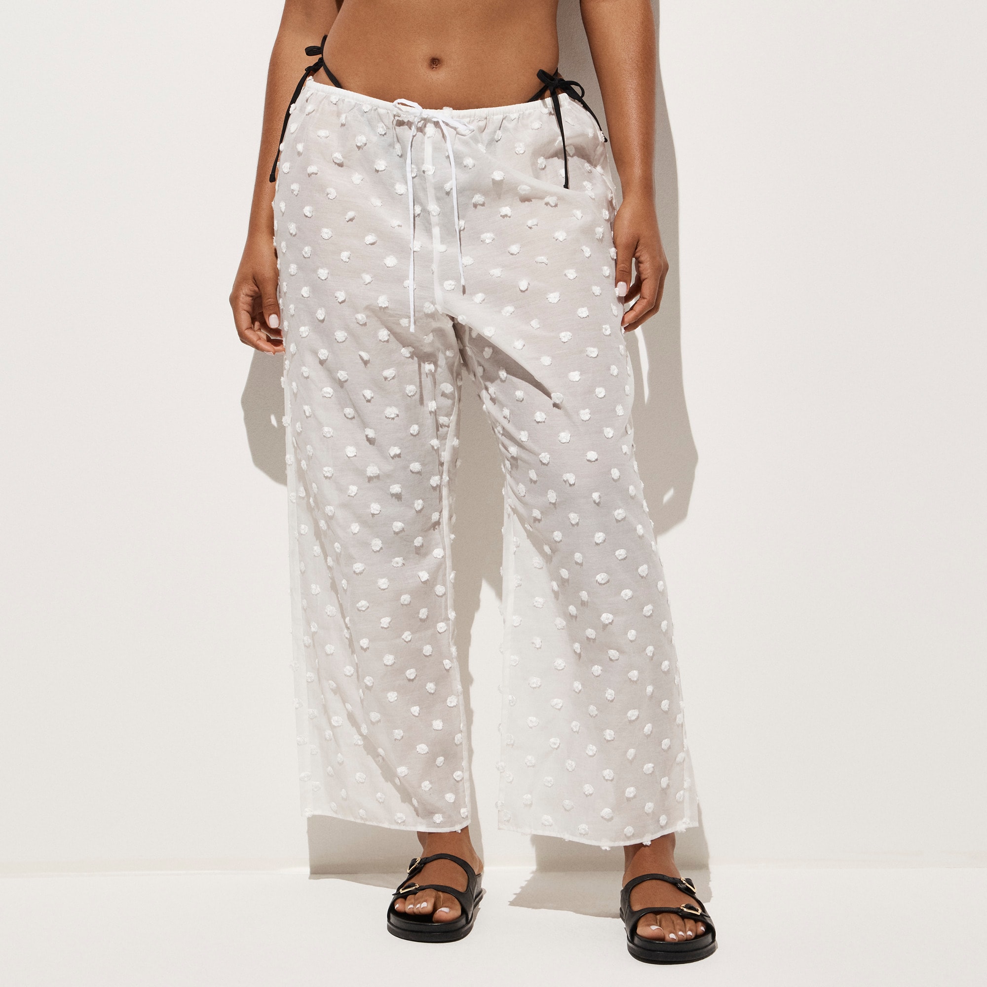 Beach pant with pom-poms