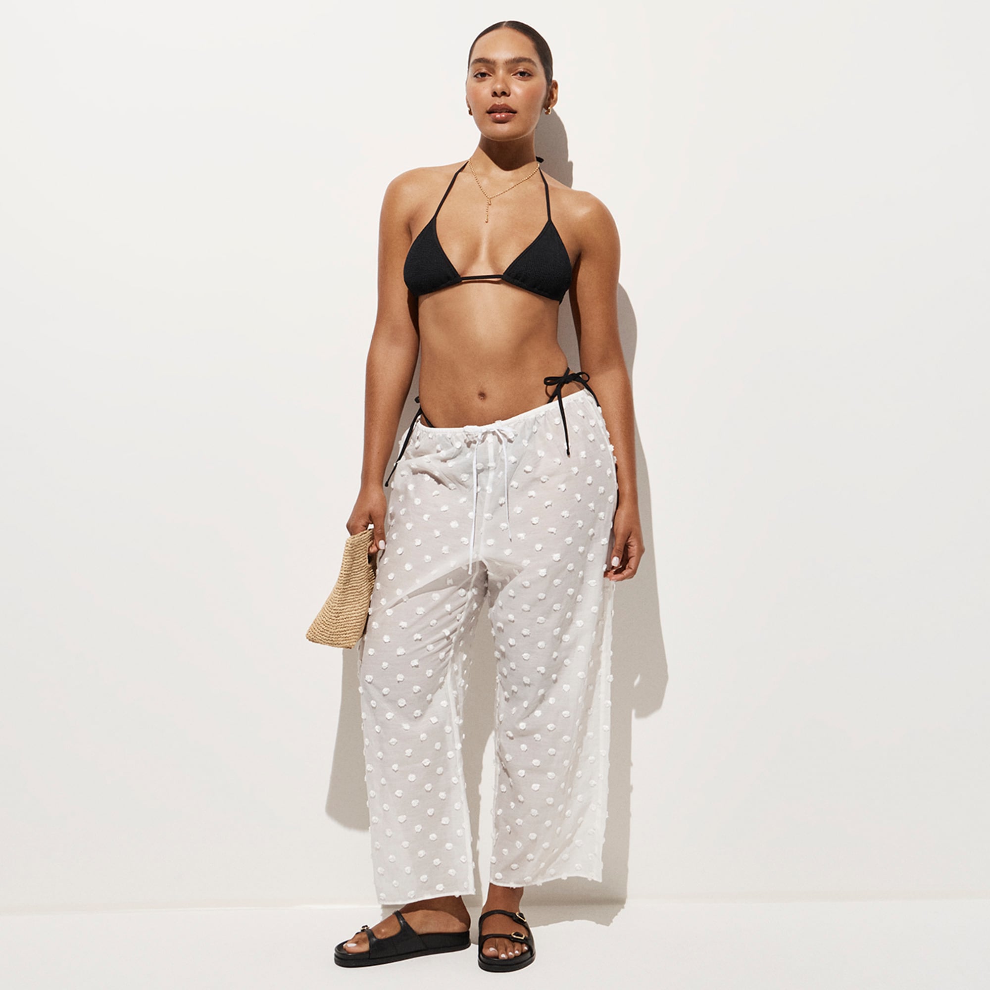 Beach pant with pom-poms