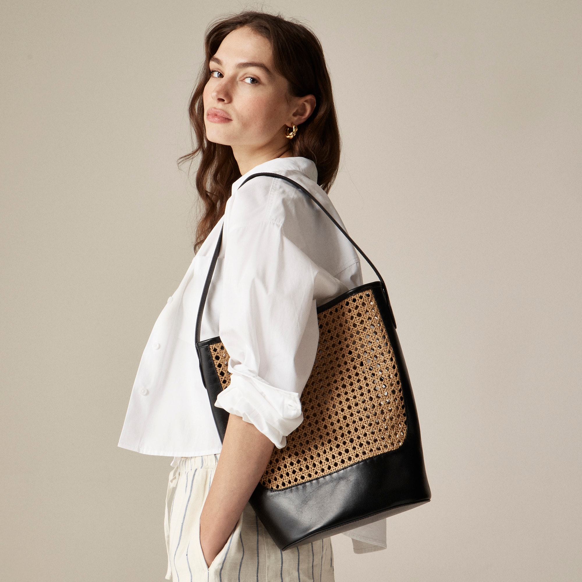 womens Berkeley bucket bag in faux raffia and leather