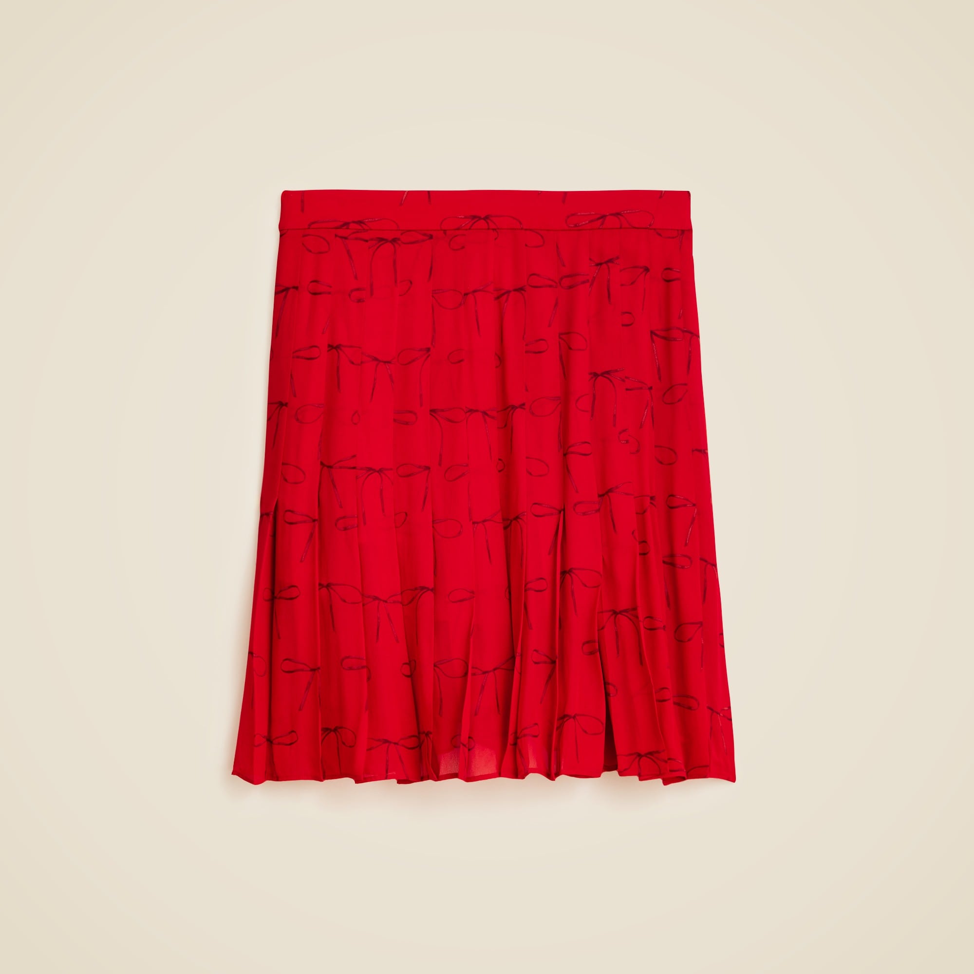 Pleated knee-length skirt in bow-print viscose chiffon